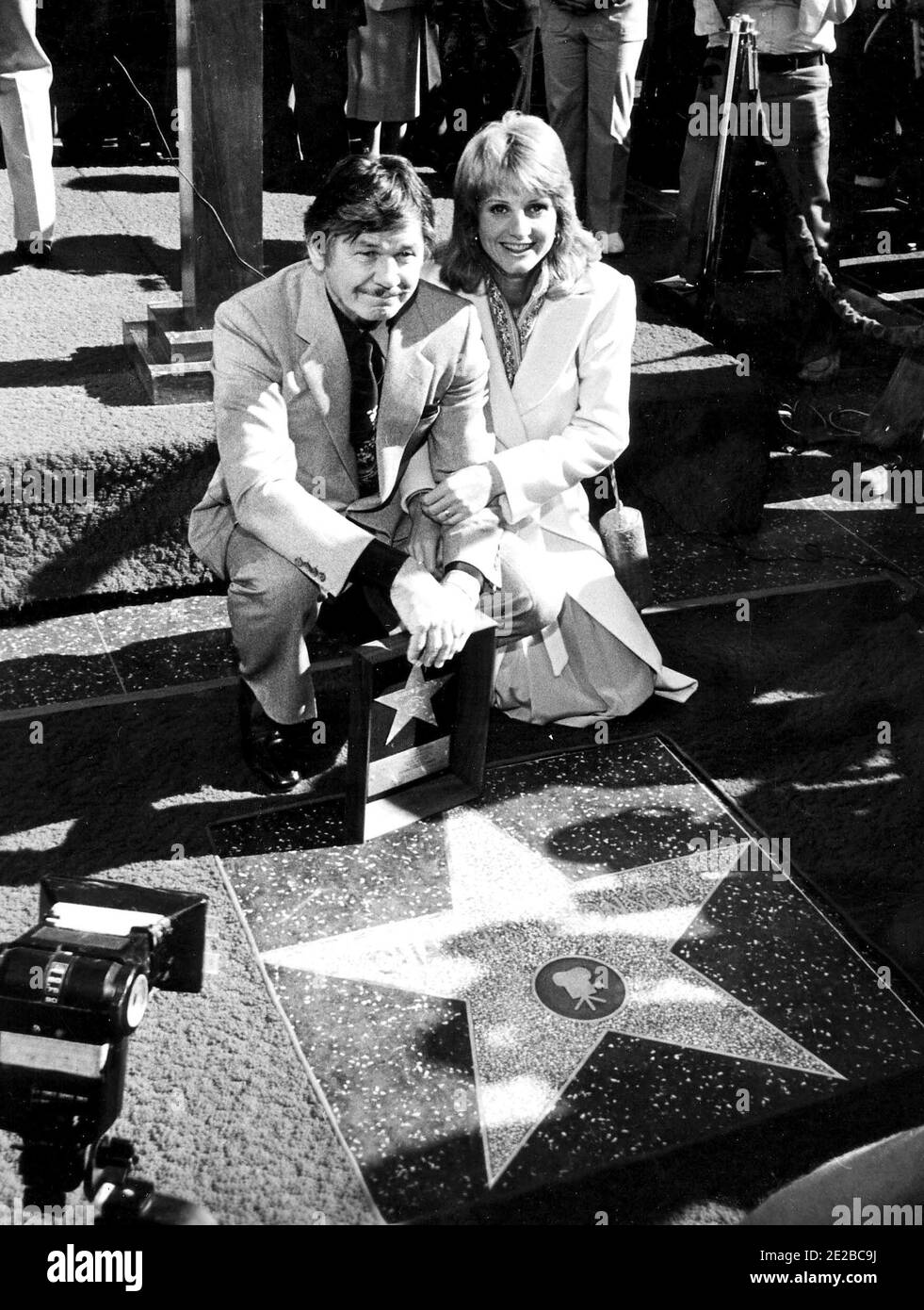 Charles Bronson and Jill Ireland at his Hollywood Walk Of Fame Ceremony, December 12, 1980.   Credit: Ralph Dominguez/MediaPunch Stock Photo