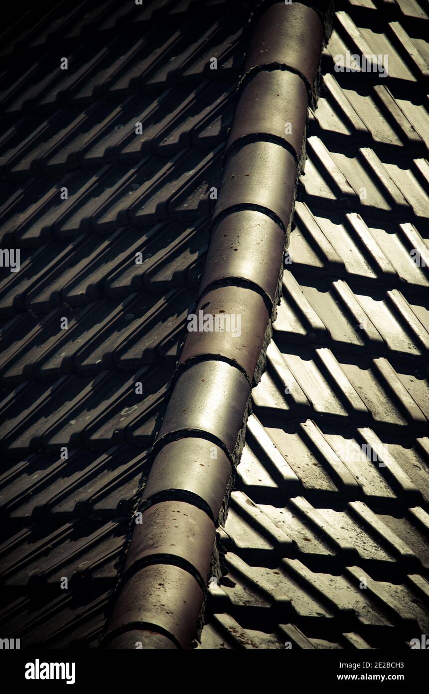 Vertical closeup of metal roof tiles Stock Photo