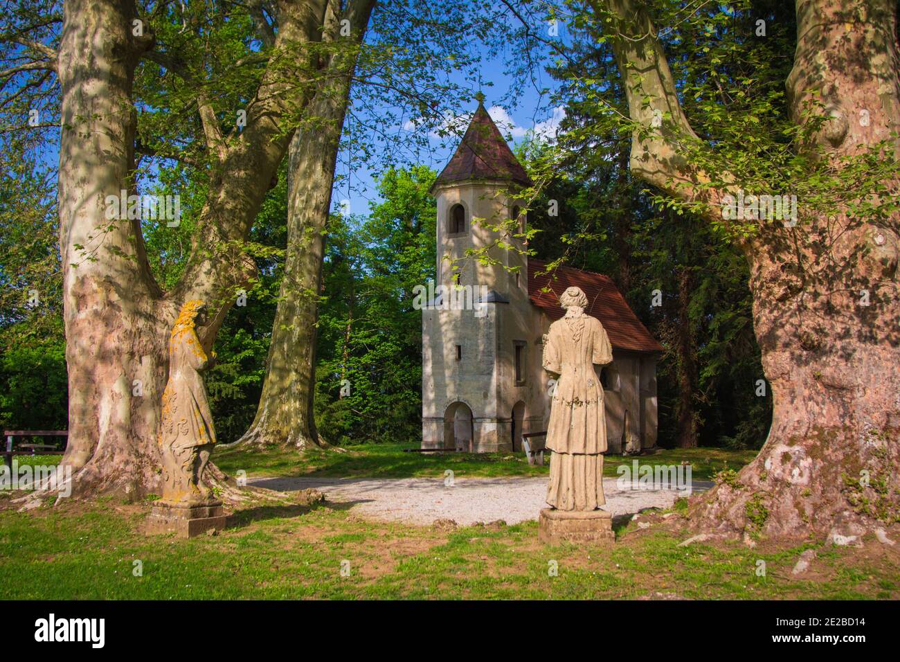 BREZICE, SLOVENIA - Apr 30, 2012: Two statues at St. Anne's chapel in Mokrice  castle park near Brezice town in Slovenia Stock Photo - Alamy