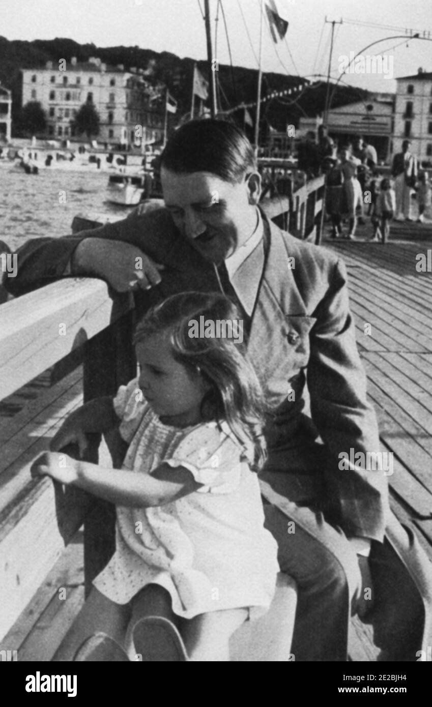 Hitler at rest, seen with Helga Susanne Goebbels (daughter of Joseph and Magda Goebbels.) Stock Photo