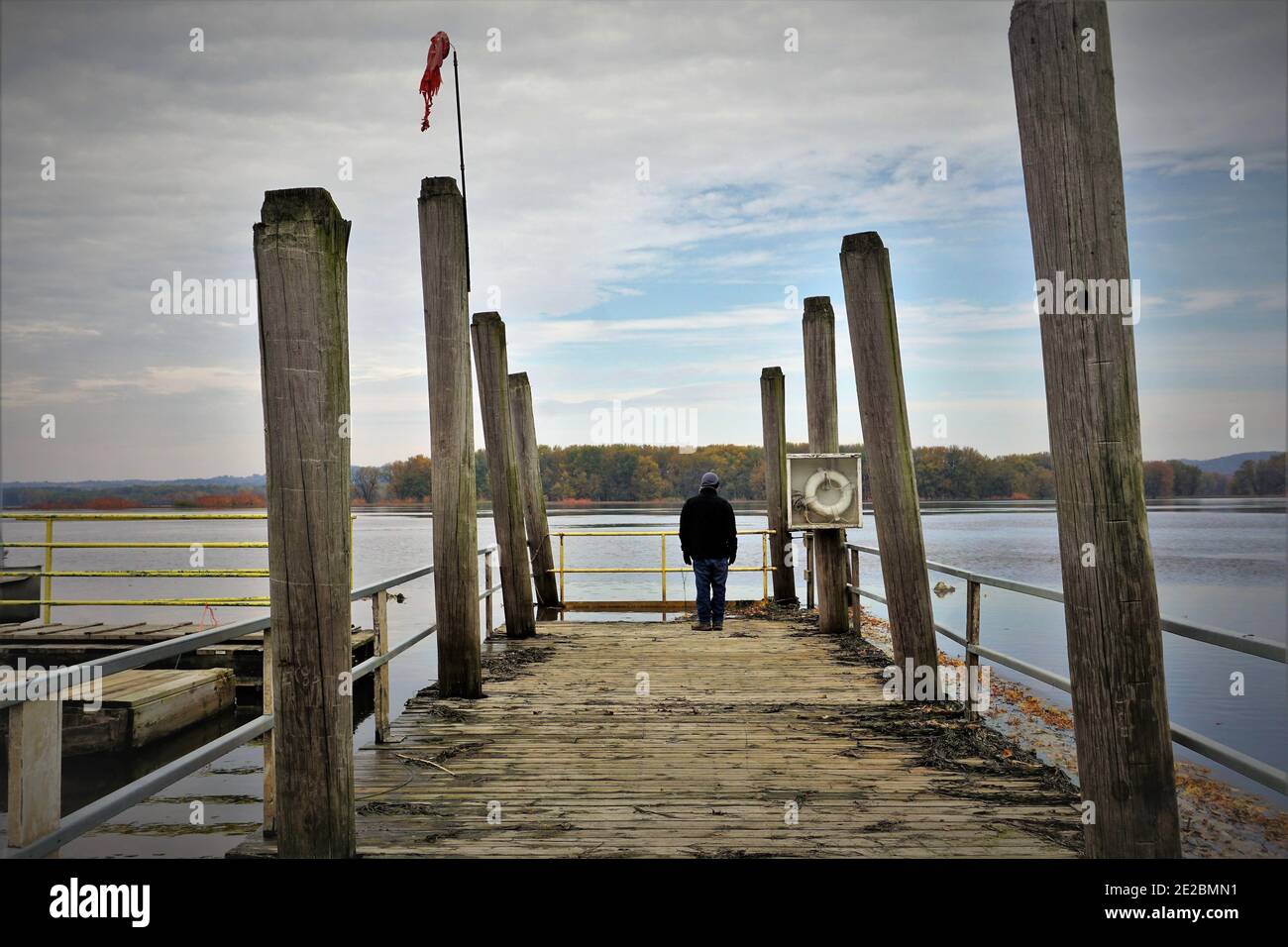 Man on a Mississippi River dock Stock Photo