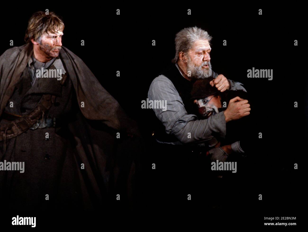 l-r: Malcolm Storry (Earl of Kent), Michael Gambon (King Lear), Antony Sher (Lear's Fool) in KING LEAR by Shakespeare at the Royal Shakespeare Company (RSC), Barbican Theatre, London EC2  31/05/1983  design: Bob Crowley  lighting: Brian Harris  fights: Malcolm Ranson  director: Adrian Noble Stock Photo