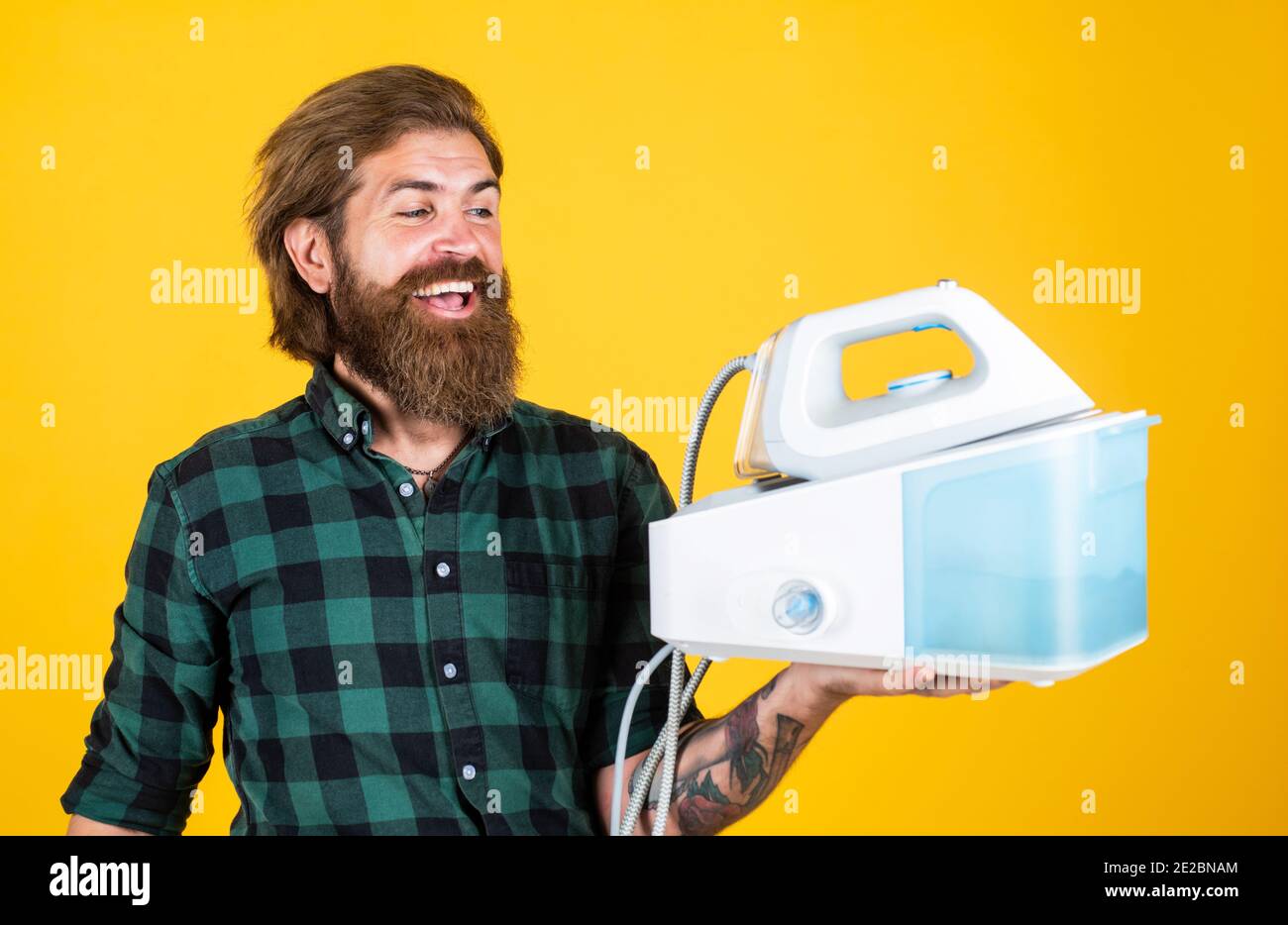 man holding iron