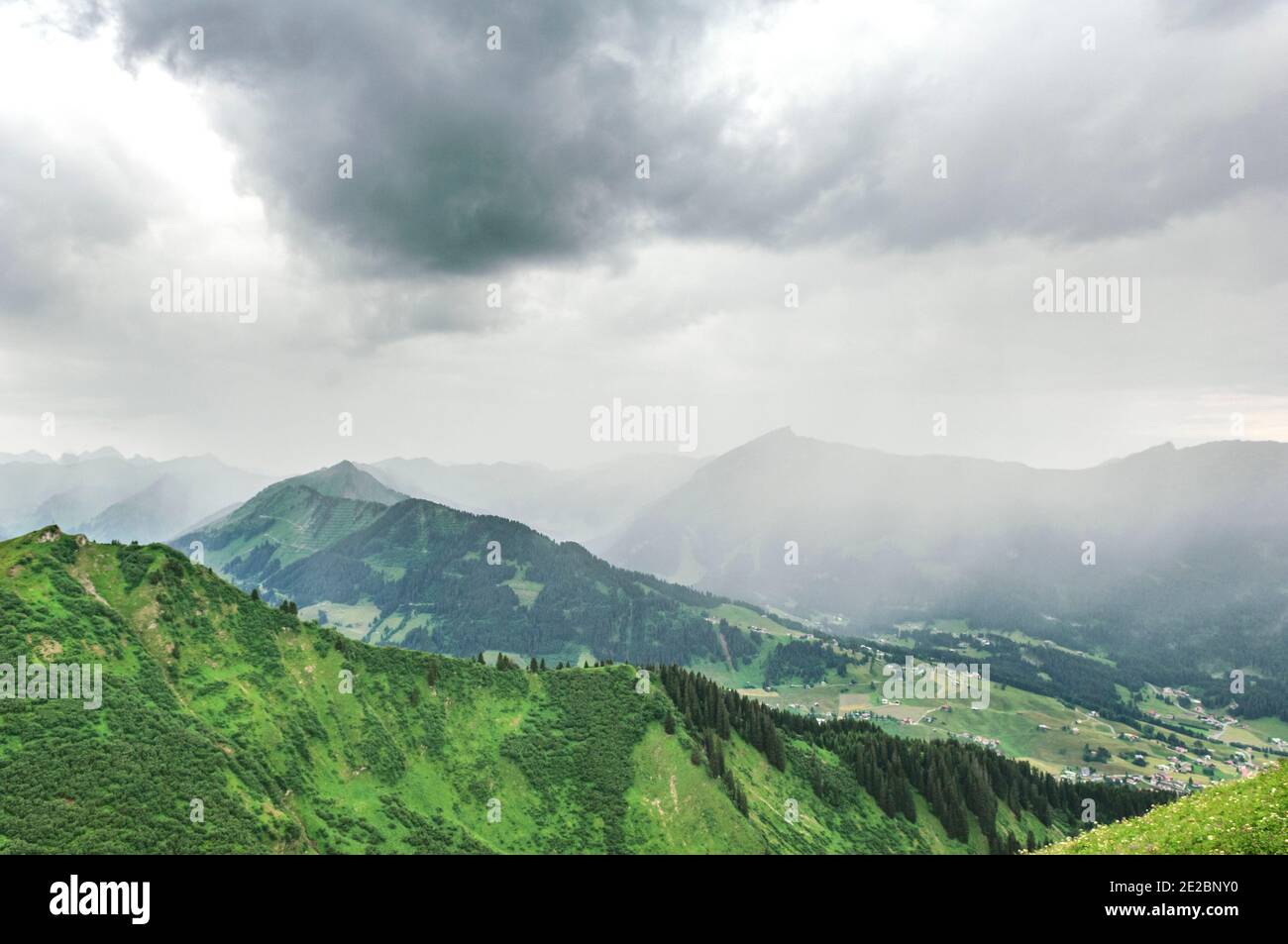 Incoming thunderstorm over Kleinwalsertal in summer Riezlern Stock Photo