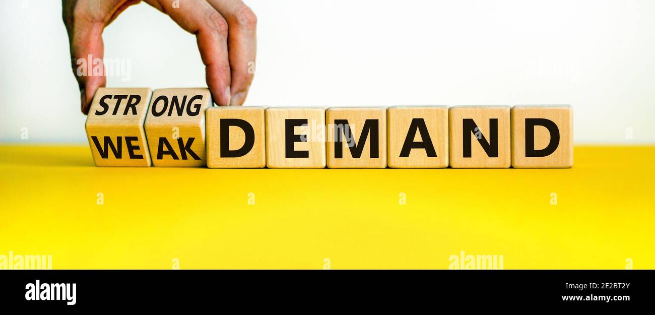 Strong Demand Strong or weak demand symbol. Businessman hand turns cubes and changes ...