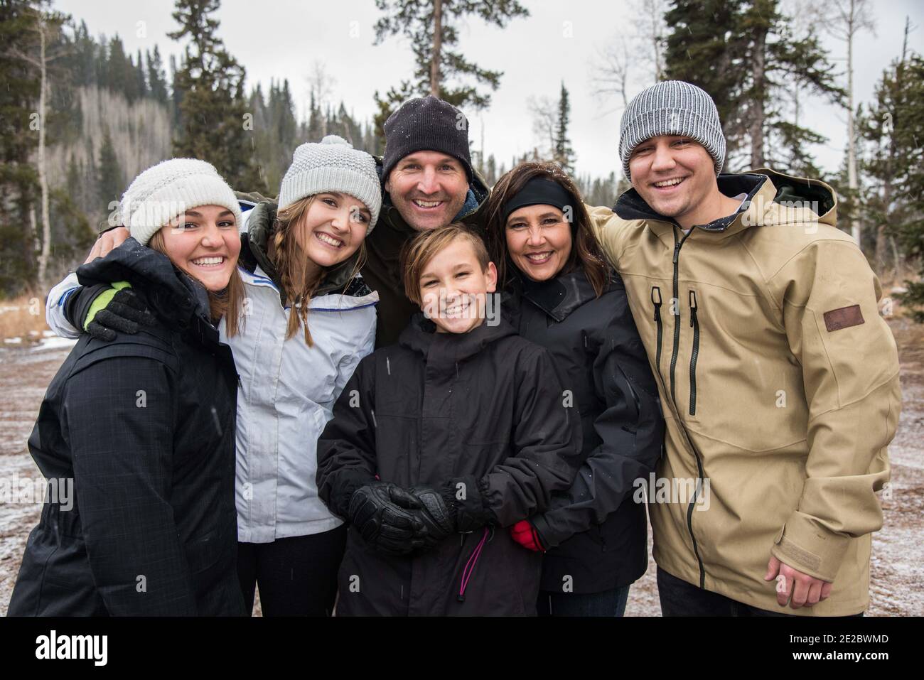 Family togetherness on a winter outing.  A simple, and informal portrait while enjoying a winter excursion. Stock Photo