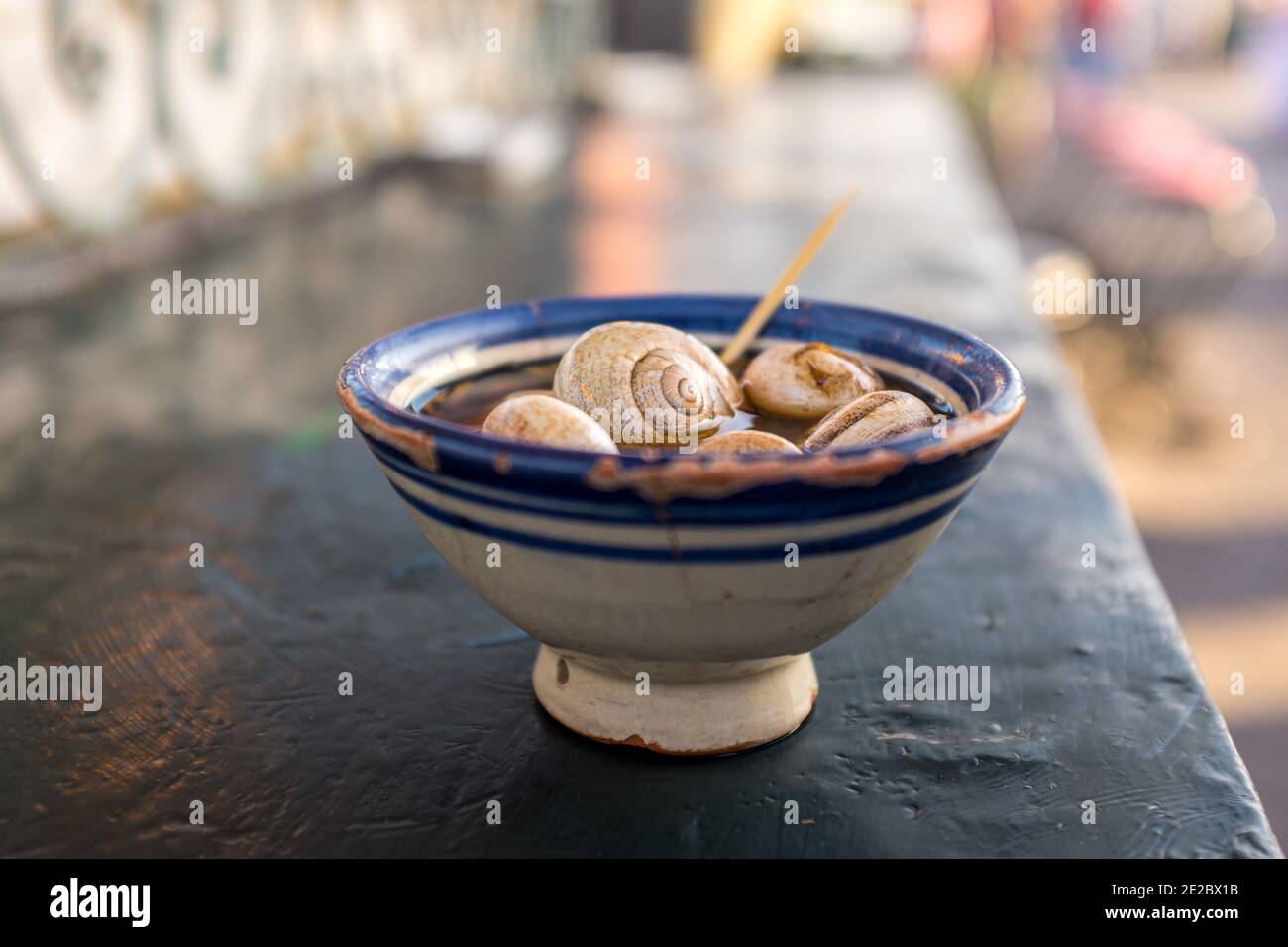 Bowl of snail soup, flavored with a concoction of around 15 spices, at a stall in Marrakech, Morocco Stock Photo