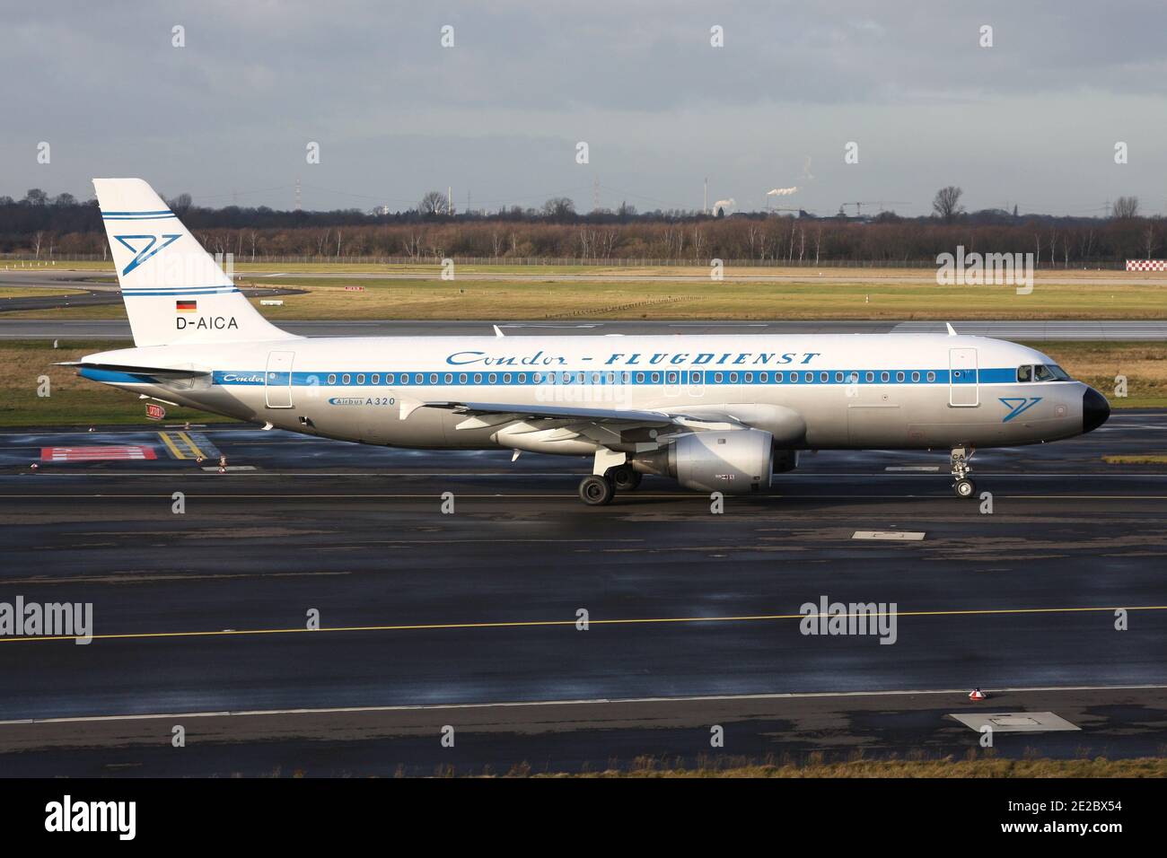 German Condor Airbus A320-200 with registration D-AICA in special retro livery on taxiway at Dusseldorf Airport. Stock Photo