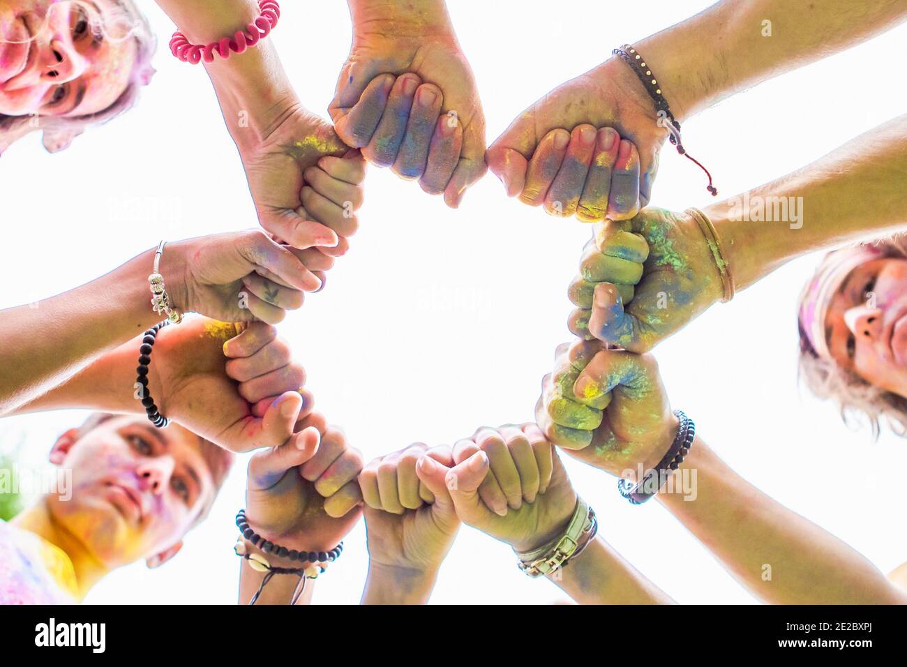 Happy friends covered in paint hi-res stock photography and images - Alamy