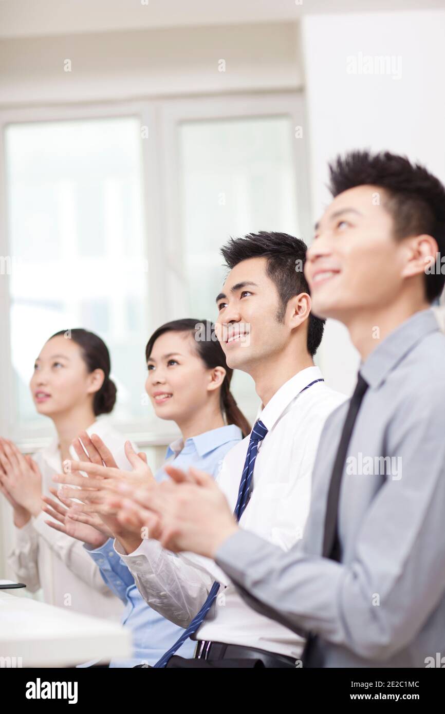 Business people applauding in office, smiling high quality photo Stock ...