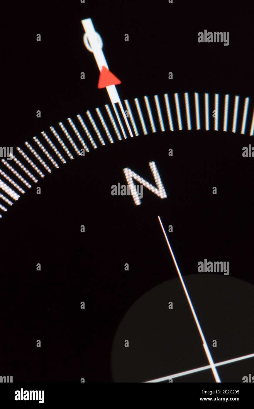 Close up detail of a digital compass pointing North on an APP on