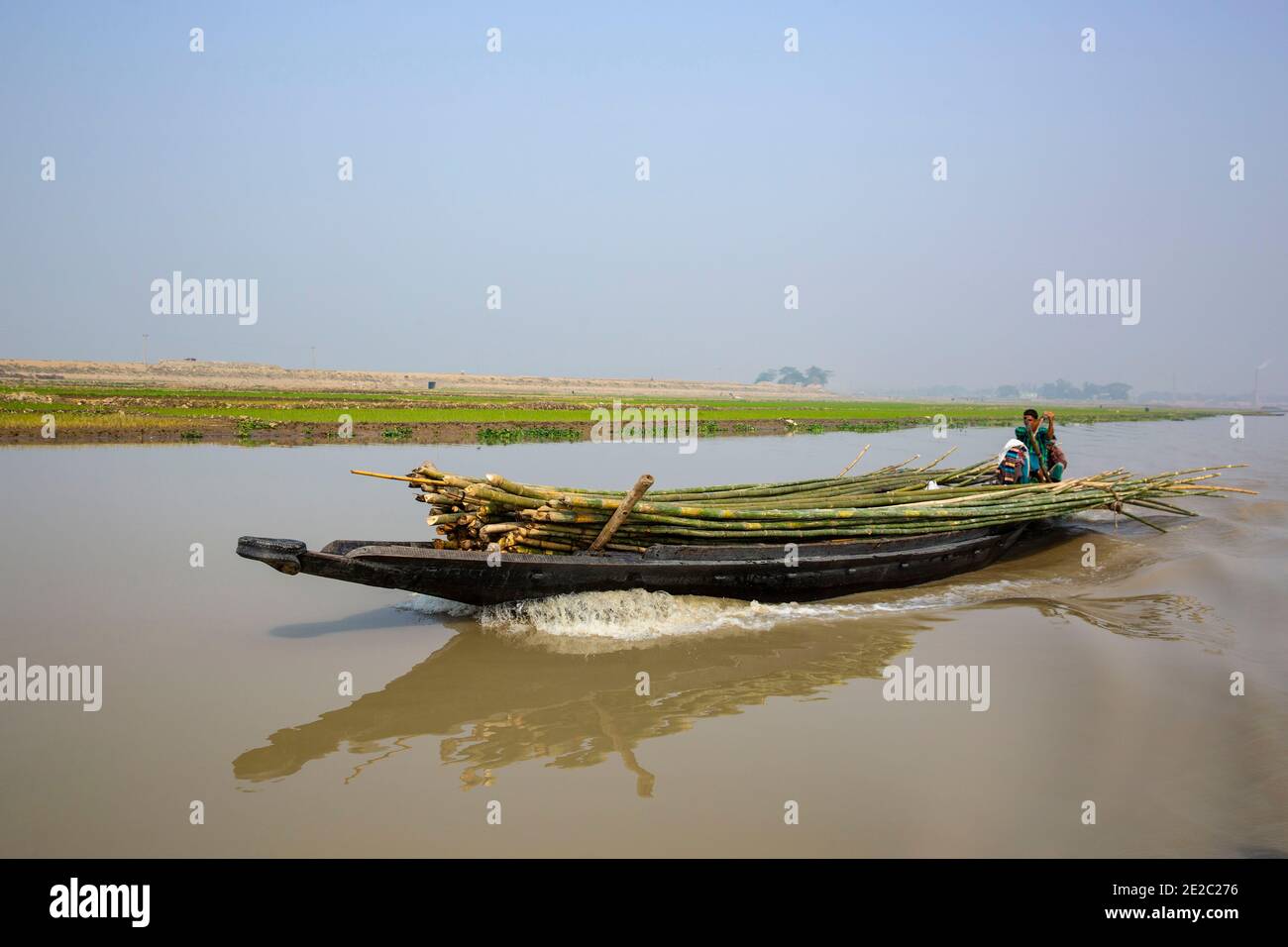 Man riding in a boat hi-res stock photography and images - Alamy
