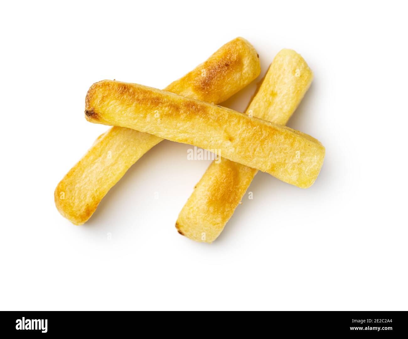 Big french fries. Fried potato chips isolated on white background. Stock Photo