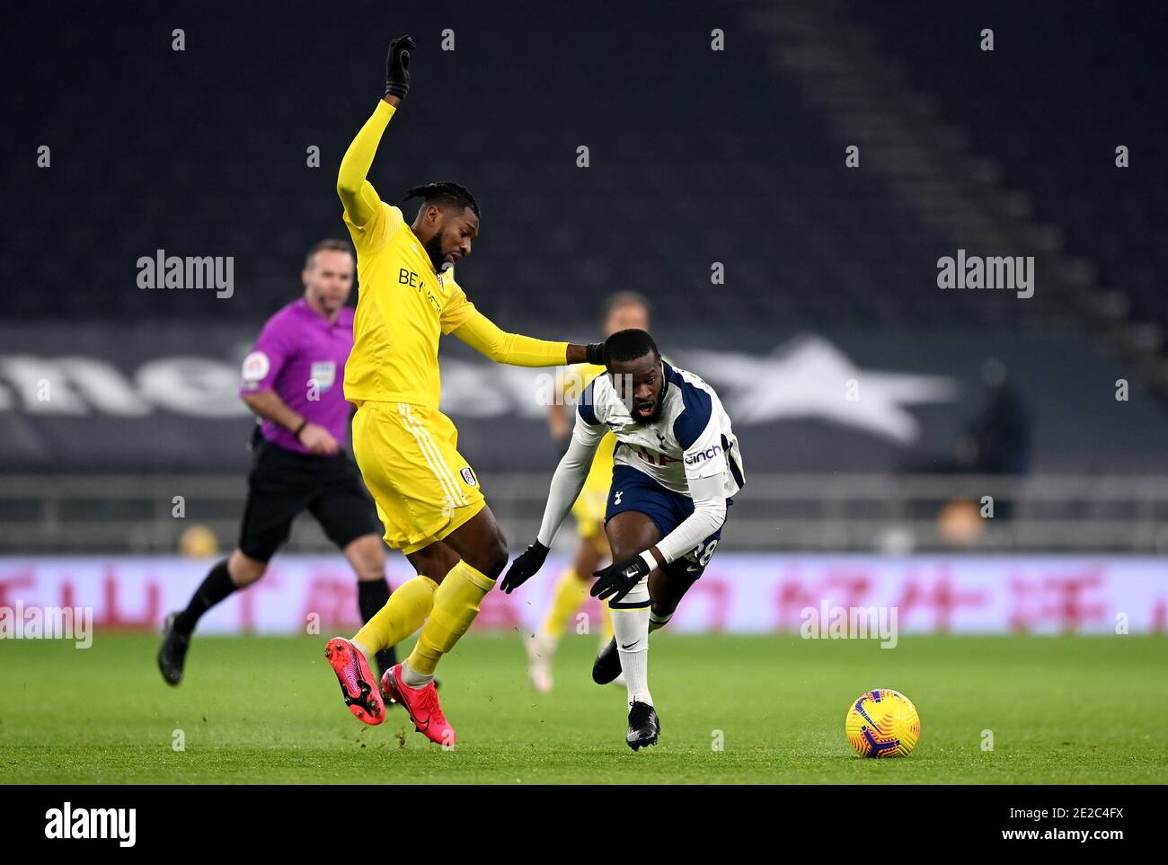 Tottenham Hotspur S Tanguy Ndombele Right And Fulham S Andre Frank Zambo Anguissa Battle For The Ball During The Premier League Match At The Tottenham Hotspur Stadium London Picture Date Wednesday January 13 21 Stock