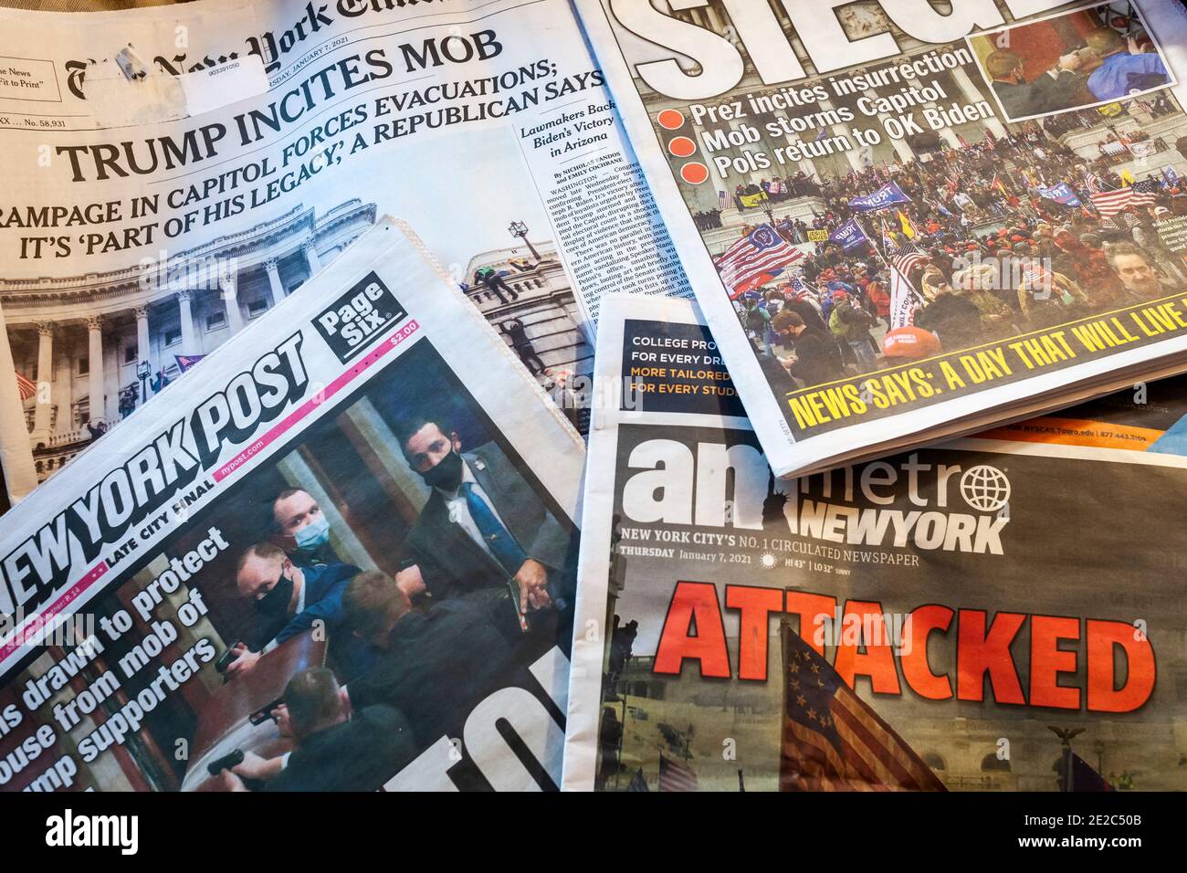 Front pages and headlines of the New York newspapers on Thursday, January 7, 2021 report on the previous days’ attack on the US. Capitol by Trump supporters interrupting the electoral vote certification.. (© Richard B. Levine) Stock Photo
