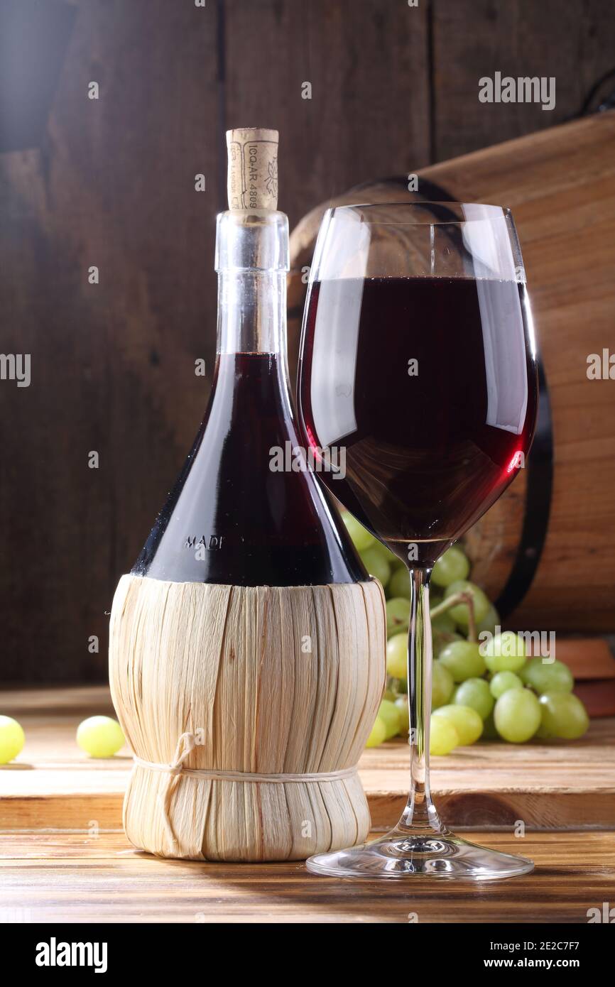 Still life with white wine and grapes Stock Photo - Alamy