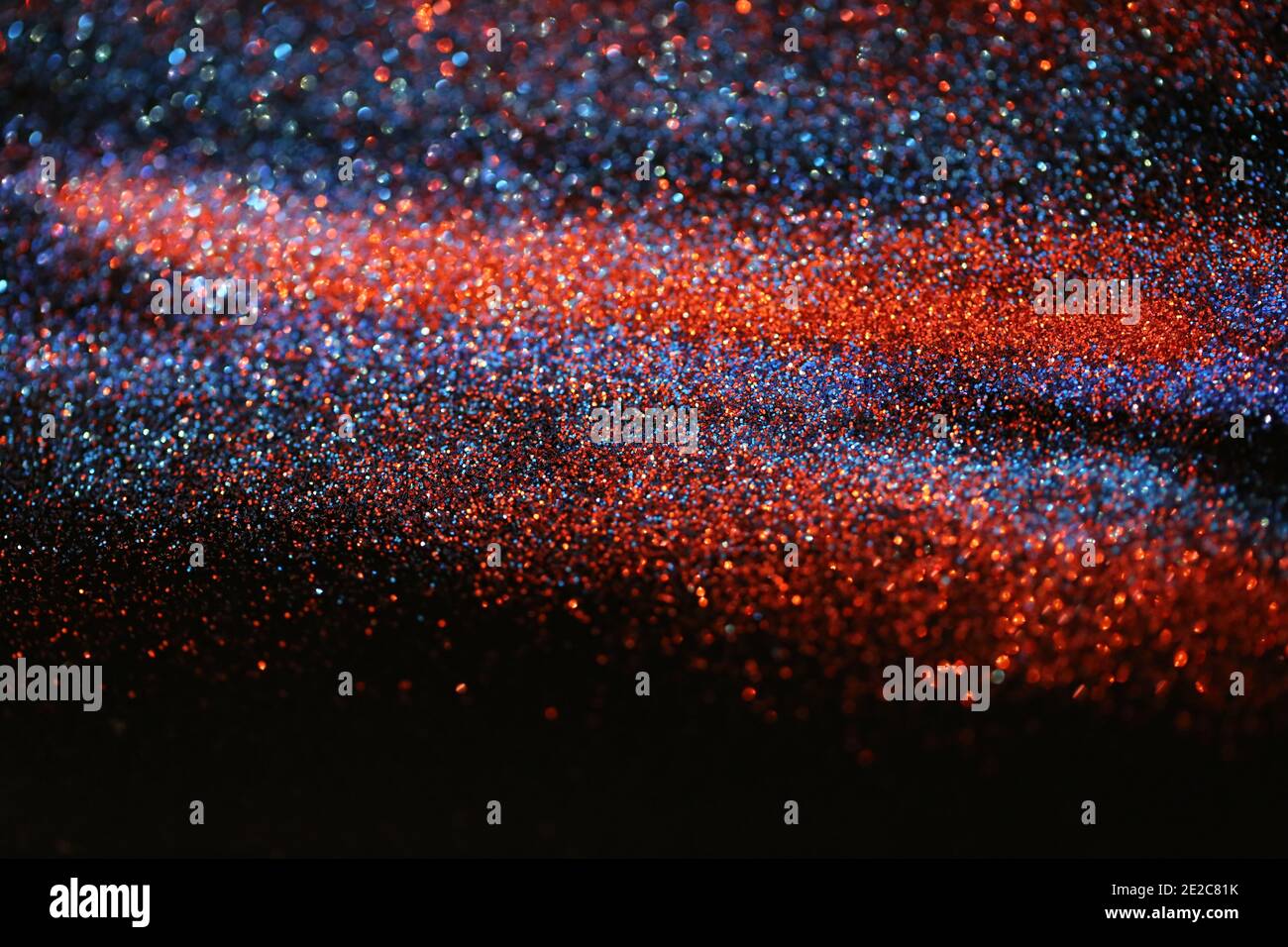 Wallpaper phone shining glitter.Glitter radiance surface. Red and blue
