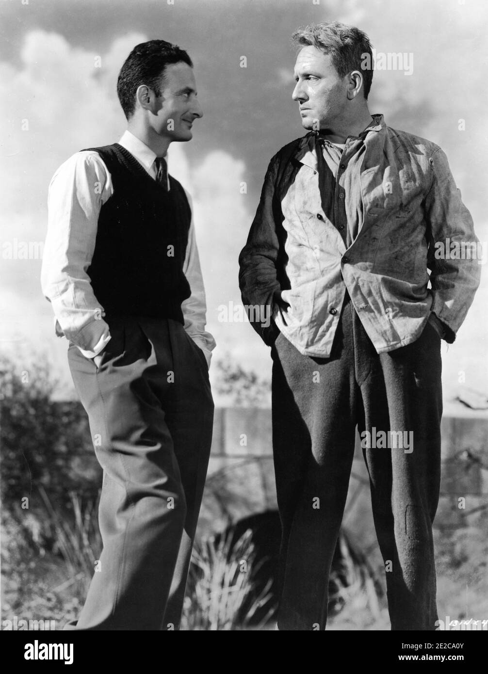 Director FRED ZINNEMANN and SPENCER TRACY on set candid during filming of THE SEVENTH CROSS 1944 director FRED ZINNEMANN based on novel by Anna Seghers Metro Goldwyn Mayer Stock Photo