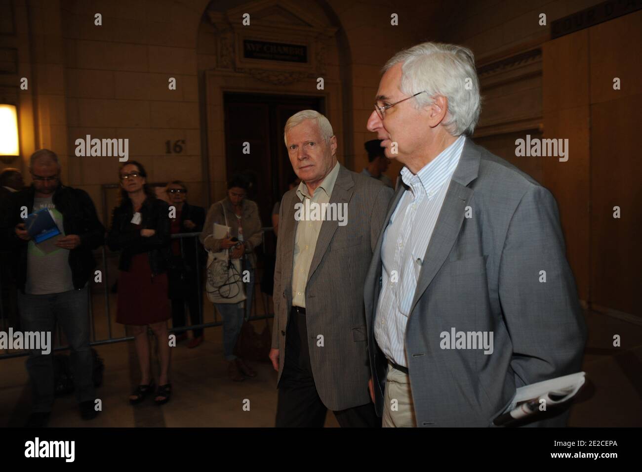 Frenchman Andre Bamberski pictured with his lawyers Laurent de Caunes at the Palais de Justice for German cardiologist Dieter Krombach's trial for the murder of Kalinka Bamberski, in Paris, France on October 4, 2011. The French court today decided to continue the trial of the German doctor, who is accused of having raped and killed his then 14-year-old stepdaughter, Kalinka Bamberski, in the summer of 1982 while she was holidaying with her mother at Krombach's home at Lake Constance, southern Germany. A court in Germany ruled that Krombach could not be held responsible for the death, but in 19 Stock Photo