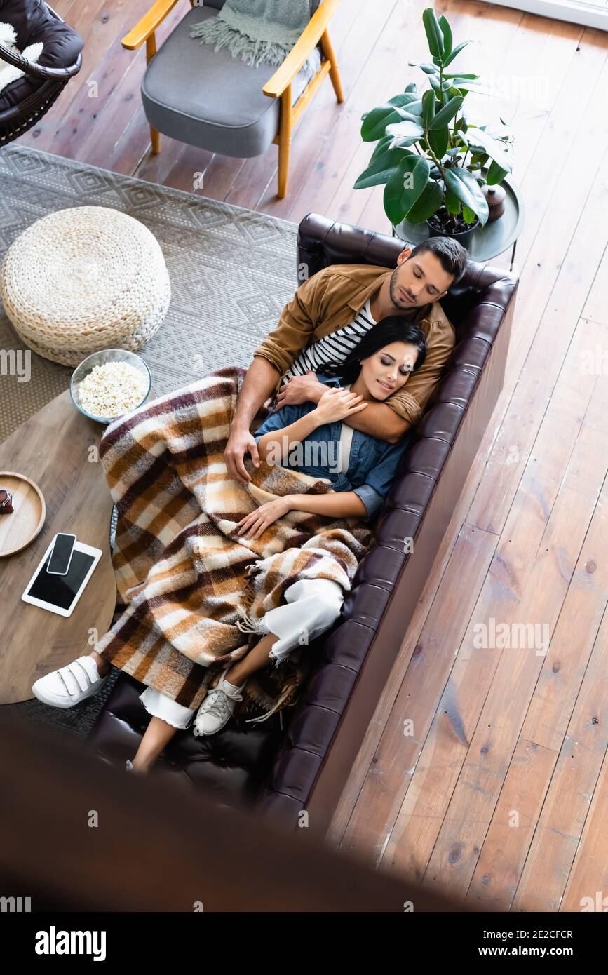 Sleeping on leather sofa hires stock photography and images Alamy