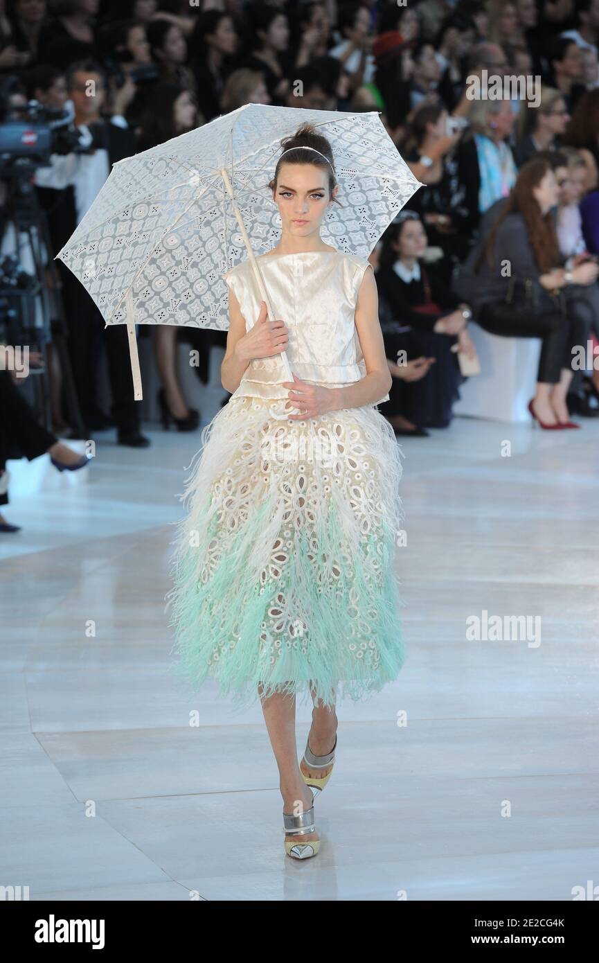 A model displays a creation by designer Marc Jacobs for Louis Vuitton  Spring-Summer 2012 Ready-To-Wear collection show held at La cour Carree du  Louvre, in Paris, France, on October 5, 2011. Photo