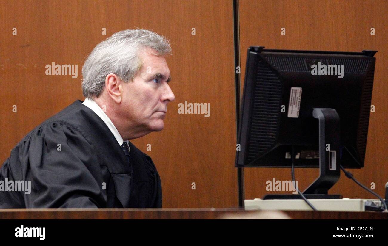 Judge Michael E. Pastor looks at a computer screen during Dr.Conrad  Murray's trial in the death of pop star Michael Jackson in Los Angeles on  October 07, 2011. Photo by Mario Anzuoni/Pool/ABACAPRESS.COM