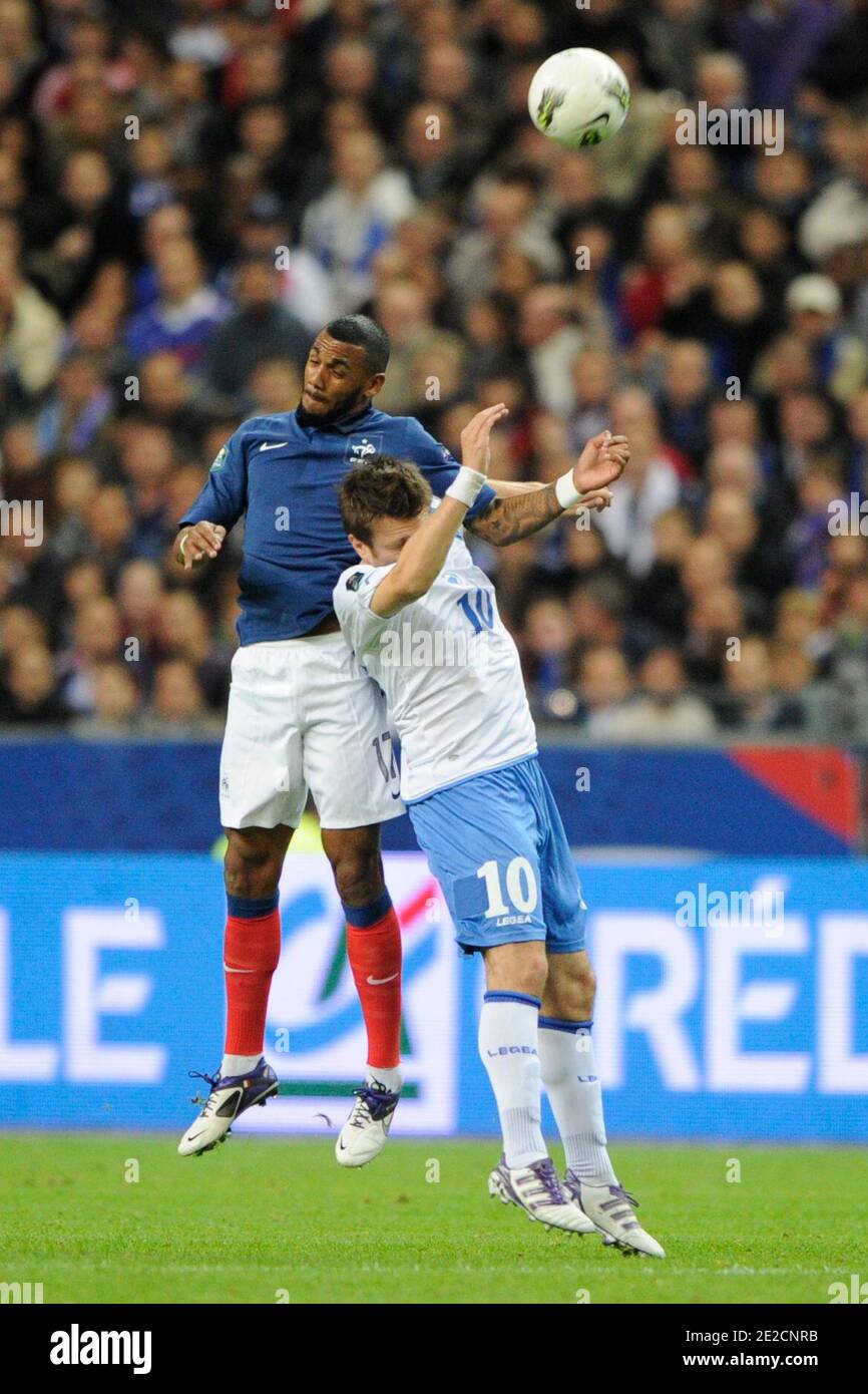 France's Yann M'Vila battles for the ball with Bosnia's Zvjezdan Misimovic  during the EURO 2012 Qualifier soccer match, GroupC, France Vs Bosnia &  Herzegovina at Stade de France in Saint-Denis, suburb of