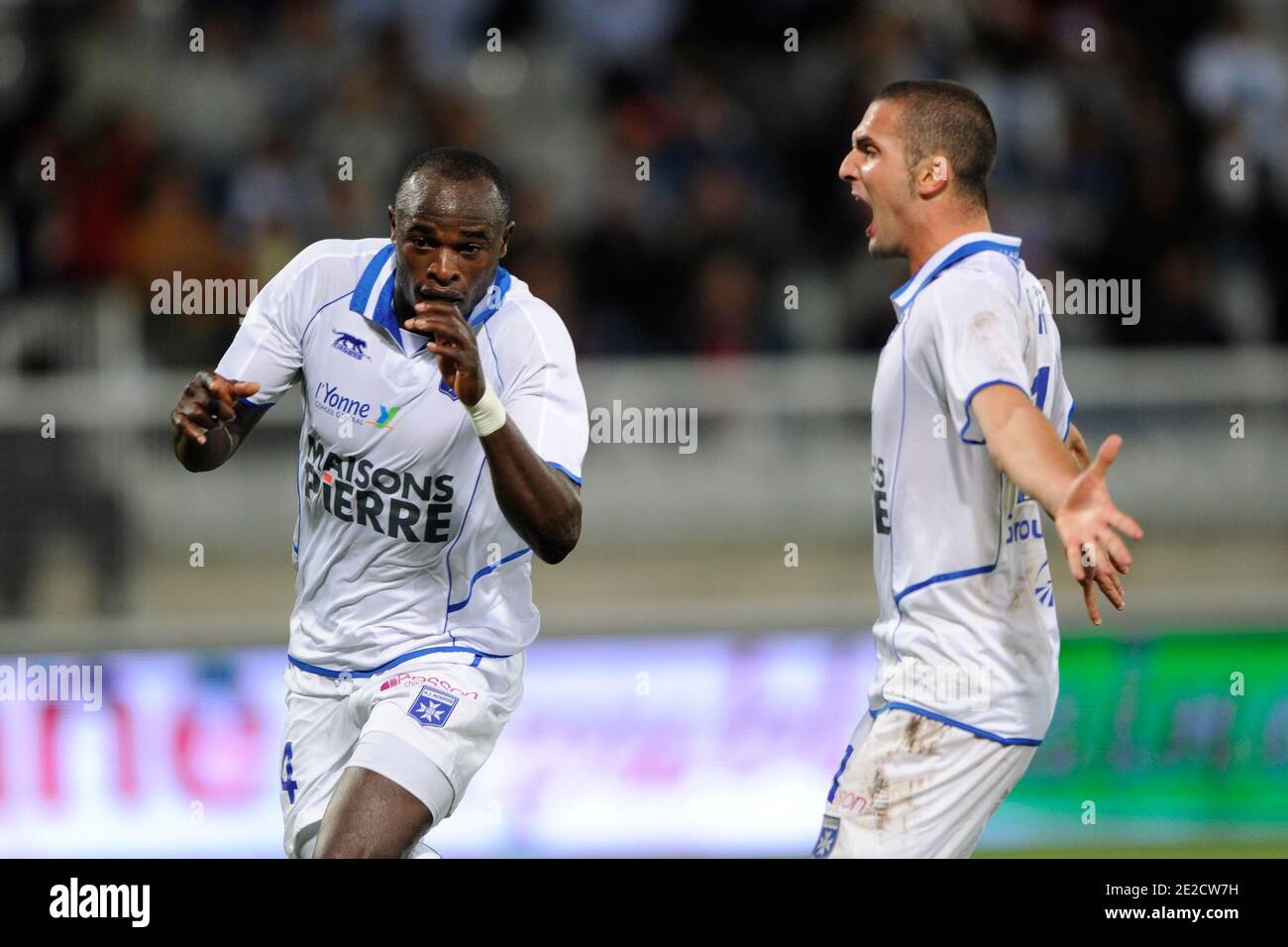 Auxerre's Dennis Oliech and Ben Sahar joy after Oliech scores the 1-0 goal during the French First League soccer match, AJ Auxerre vs Lille OSC in Auxerre, France, on October 15, 2011. Lille won 3-1. Photo by Henri Szwarc/ABACAPRESS.COM Stock Photo