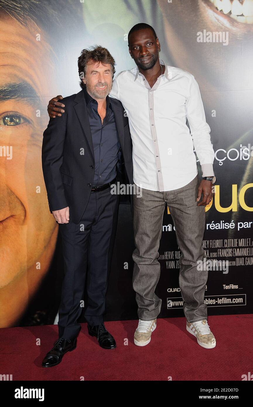 Francois Cluzet and Omar Sy attending the Premiere of 'Intouchables' held at Cinema Gaumont Marignan in Paris, France on October 18, 2011. Photo by Nicolas Briquet/ABACAPRESS.COM Stock Photo