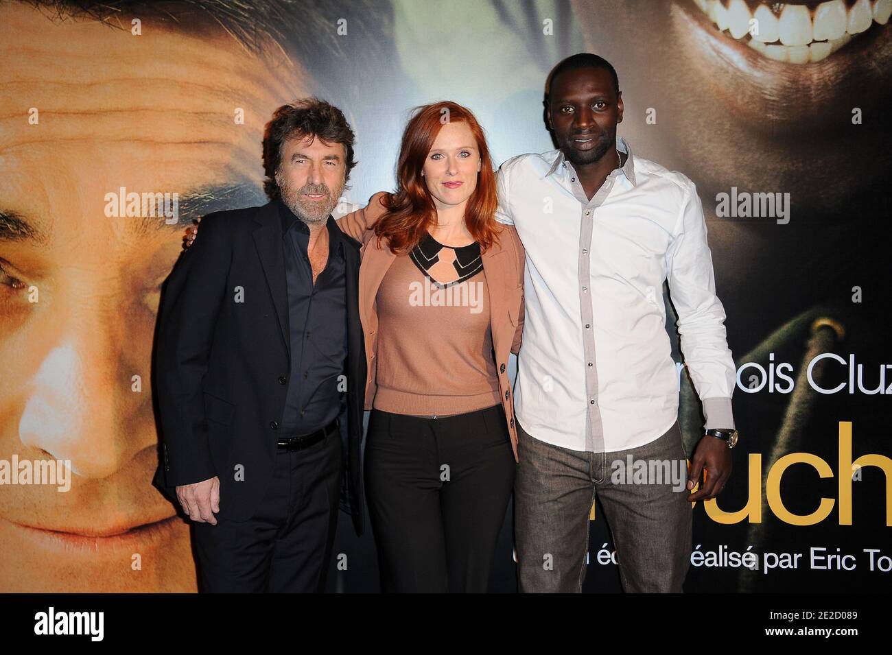 Francois Cluzet, Audrey Fleurot and Omar Sy attending the Premiere of 'Intouchables' held at Cinema Gaumont Marignan in Paris, France on October 18, 2011. Photo by Nicolas Briquet/ABACAPRESS.COM Stock Photo