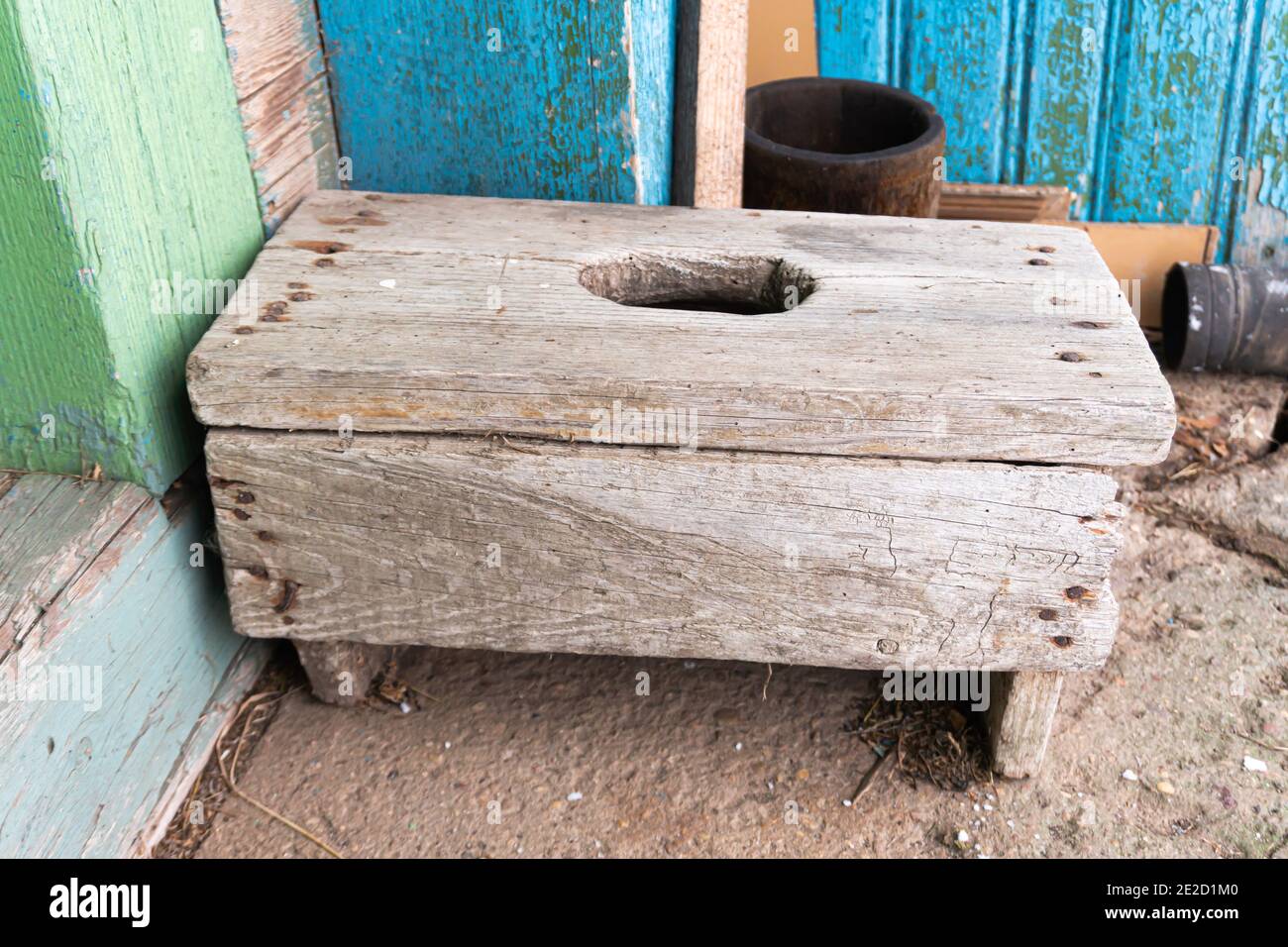 Wooden stool with on sale hole in seat