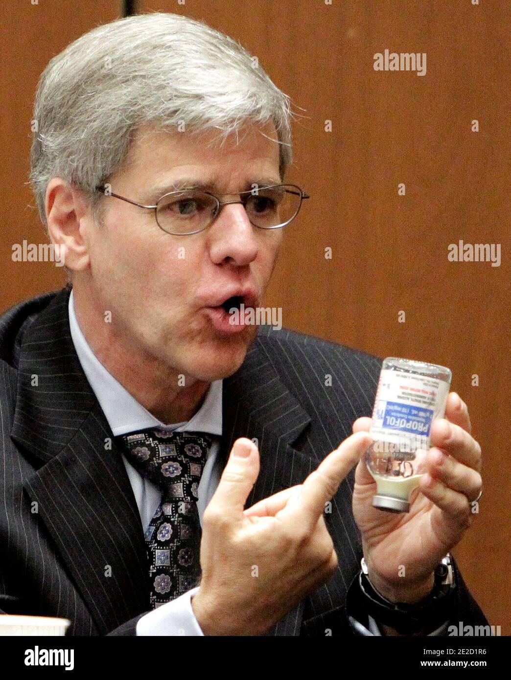 Anesthesiology expert Dr. Steven Shafer gestures to a Propofol bottle during Dr. Conrad Murray's involuntary manslaughter trial in downtown Los Angeles on October 19, 2011. Murray has pleaded not guilty and faces four years in prison and the loss of his medical license if convicted of involuntary manslaughter in Michael Jackson's death. Photo by Reed Saxon/Pool/ABACAPRESS.COM Stock Photo