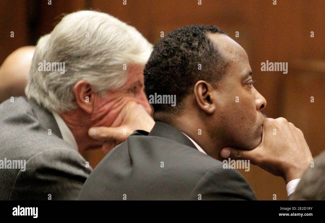 Dr. Conrad Murray, right, and his attorney J. Michael Flanagan listen to the testimony of anesthesiology expert Dr. Steven Shafer during Murray's involuntary manslaughter trial in downtown Los Angeles on October 19, 2011. Murray has pleaded not guilty and faces four years in prison and the loss of his medical license if convicted of involuntary manslaughter in Michael Jackson's death. Photo by Reed Saxon/Pool/ABACAPRESS.COM Stock Photo