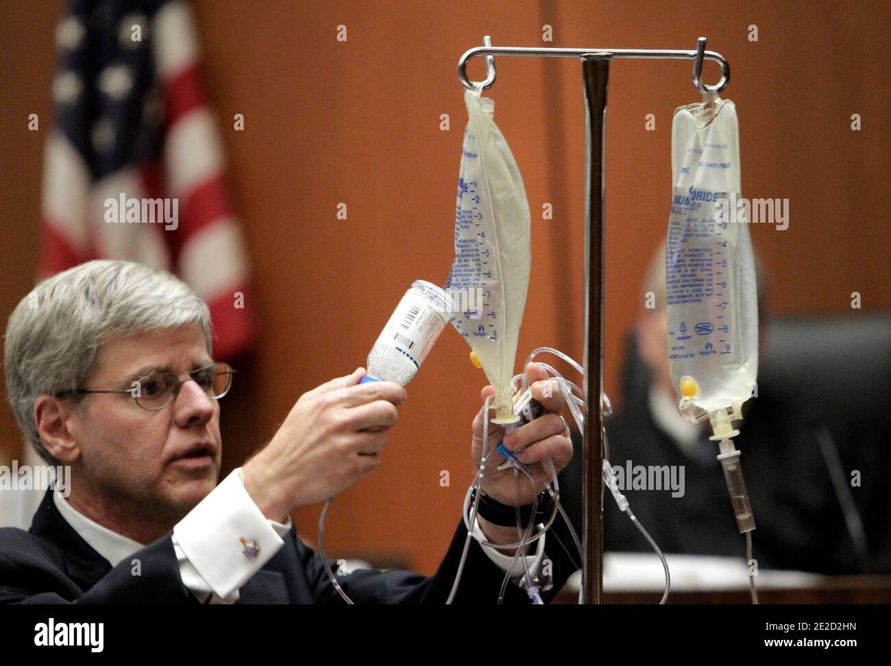 Anesthesiology expert Dr. Steven Shafer, left, places a bottle of propofol into an empty saline bag as he demonstrates the use of propofol during Dr. Conrad Murray's involuntary manslaughter trial in Los Angeles on October 20, 2011. Murray has pleaded not guilty and faces four years in prison and the loss of his medical license if convicted of involuntary manslaughter in Michael Jackson's death. Photo by Reed Saxon/Pool/ABACAPRESS.COM Stock Photo