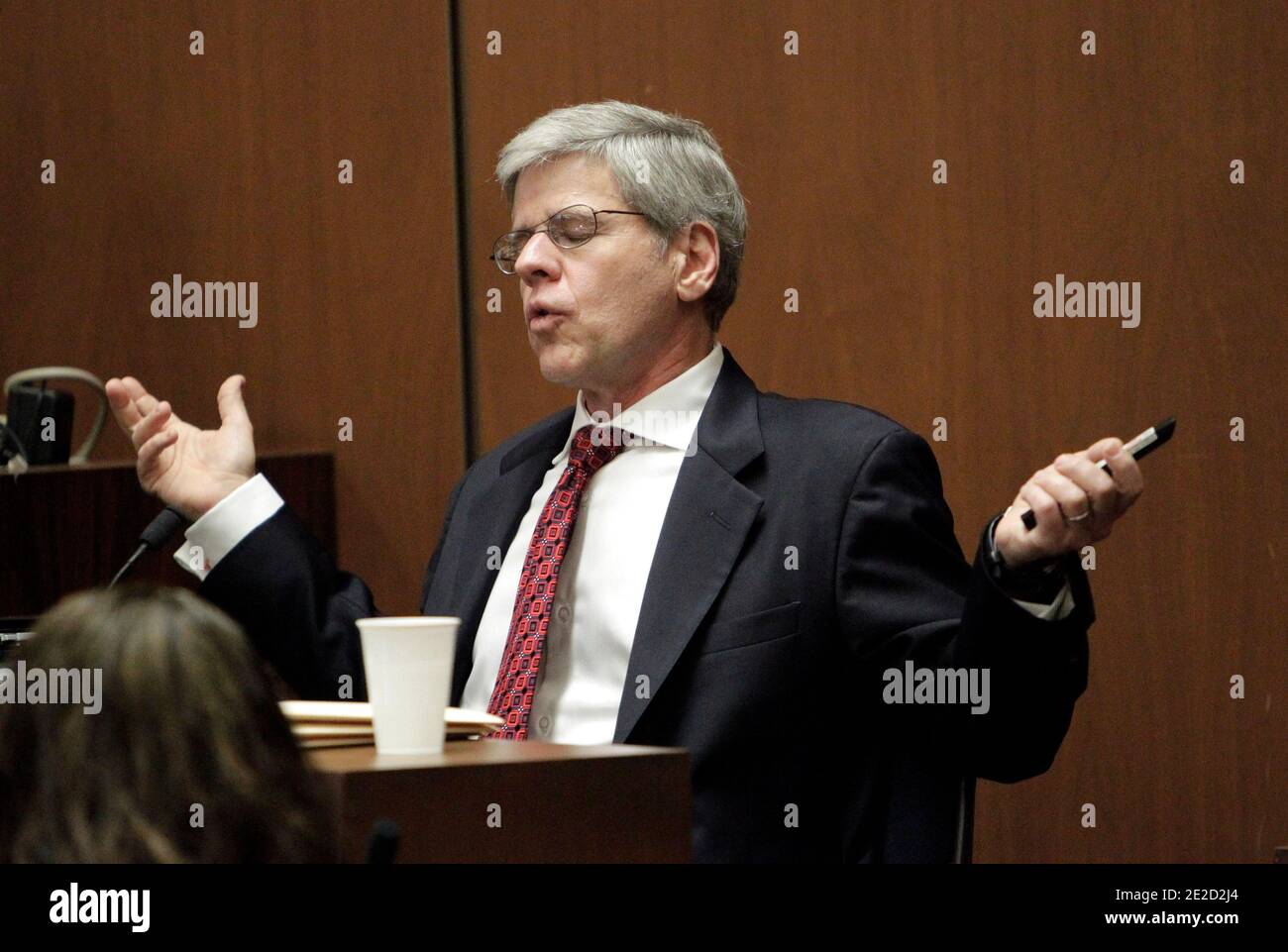 Anesthesiology expert Dr. Steven Shafer pantomimes as he discusses the possibility of a patient, after self-injecting Propofol, waking up and attempting to re-inject, while testifying during Dr. Conrad Murray's involuntary manslaughter trial in Los Angeles on October 20, 2011. Murray has pleaded not guilty and faces four years in prison and the loss of his medical license if convicted of involuntary manslaughter in Michael Jackson's death. Photo by Reed Saxon/Pool/ABACAPRESS.COM Stock Photo