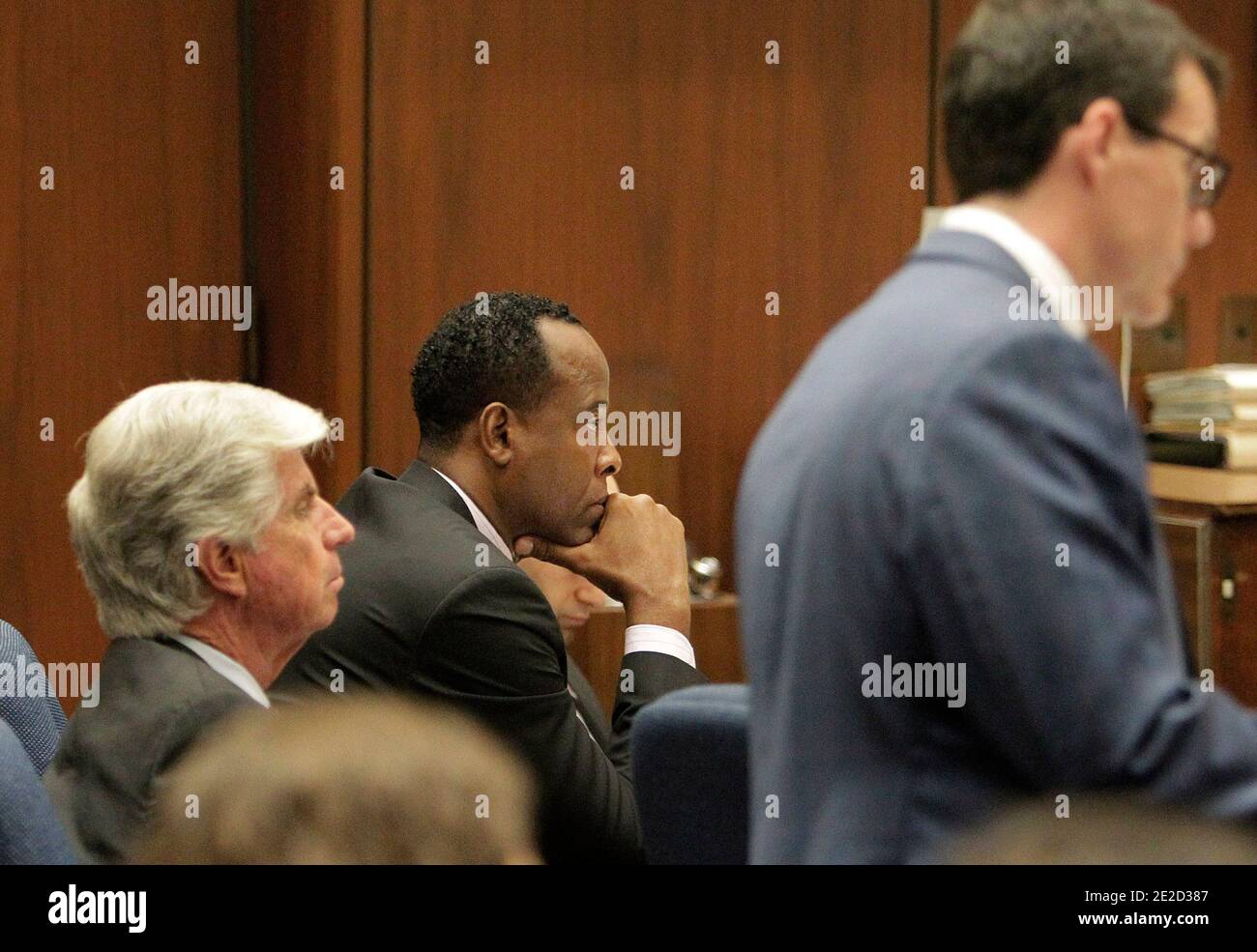 Dr. Conrad Murray, center, listens as defense attorney Ed Chernoff, foreground, cross examines anesthesiology expert Dr. Steven Shafer, during Murray's involuntary manslaughter trial in Los Angeles, CA, USA, on October 21, 2011. Murray has pleaded not guilty and faces four years in prison and the loss of his medical license if convicted of involuntary manslaughter in Michael Jackson's death. Photo by Reed Saxon/Pool/ABACAPRESS.COM Stock Photo