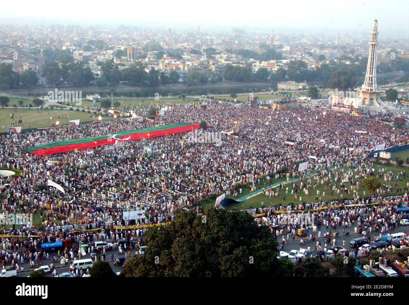 Supporters of Pakistani politician and former cricketer Imran Khan gathered for a rally in Lahore, Pakistan on October 30, 2011. A crowd of thousands gathered called by Khan to press President Asif Ali Zardari to step down. The rally, seen as a show of strength, comes two days after Sharif's brother Shahbaz, attracted some 30,000 people at an anti-Zardari protest also in the key political battleground of Lahore. Photo by Irfan/ABACAPRESS.COM Stock Photo