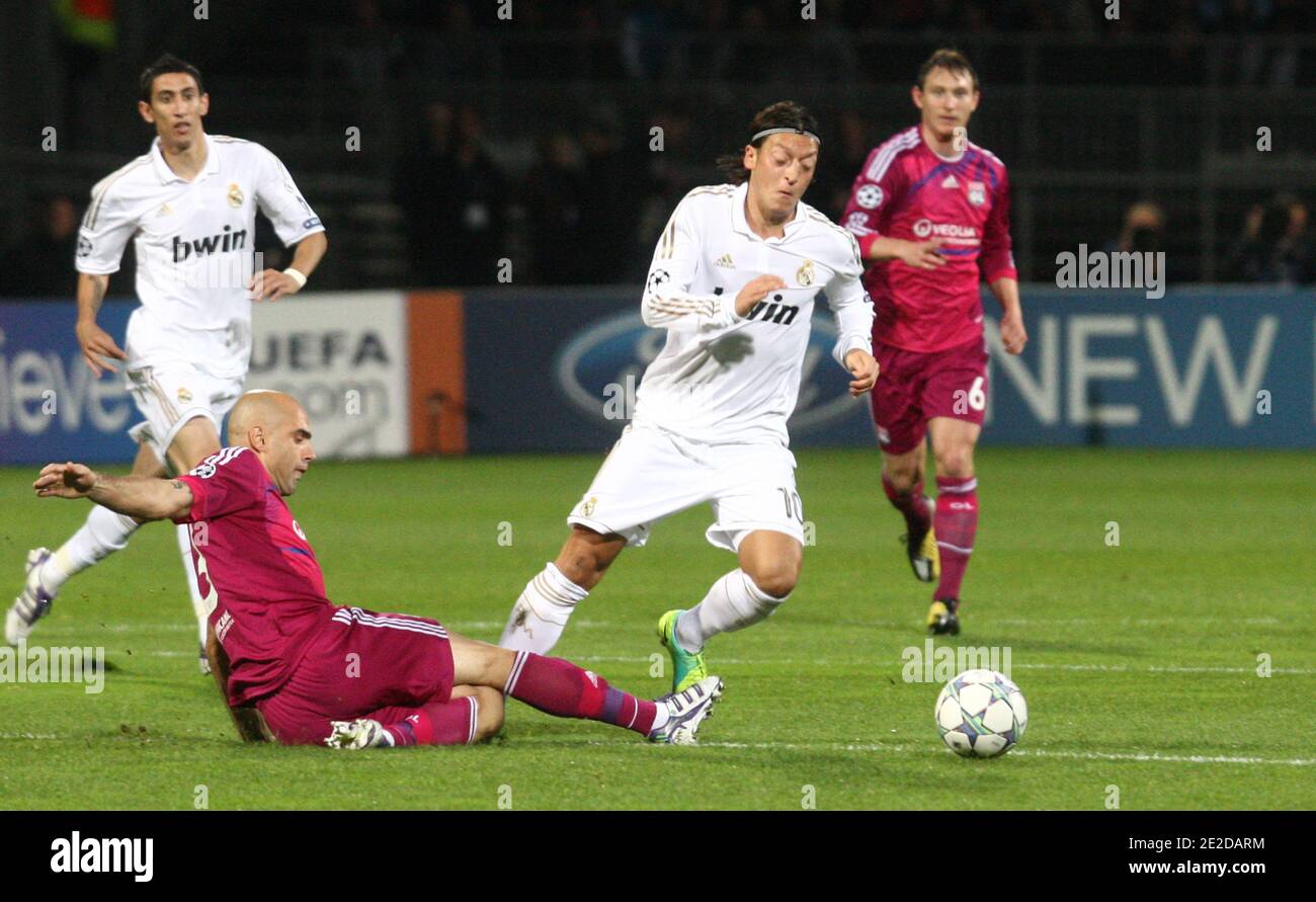 Lyon's Cris battles Real Madrid's Mesut Ozil during the UEFA Champions League soccer match, Olympique Lyonnais Vs Real Madrid at Gerland stadium in Lyon, France on November 2, 2011. Real Madrid won 2-0. Photo by Vincent Dargent/ABACAPRESS.COM Stock Photo