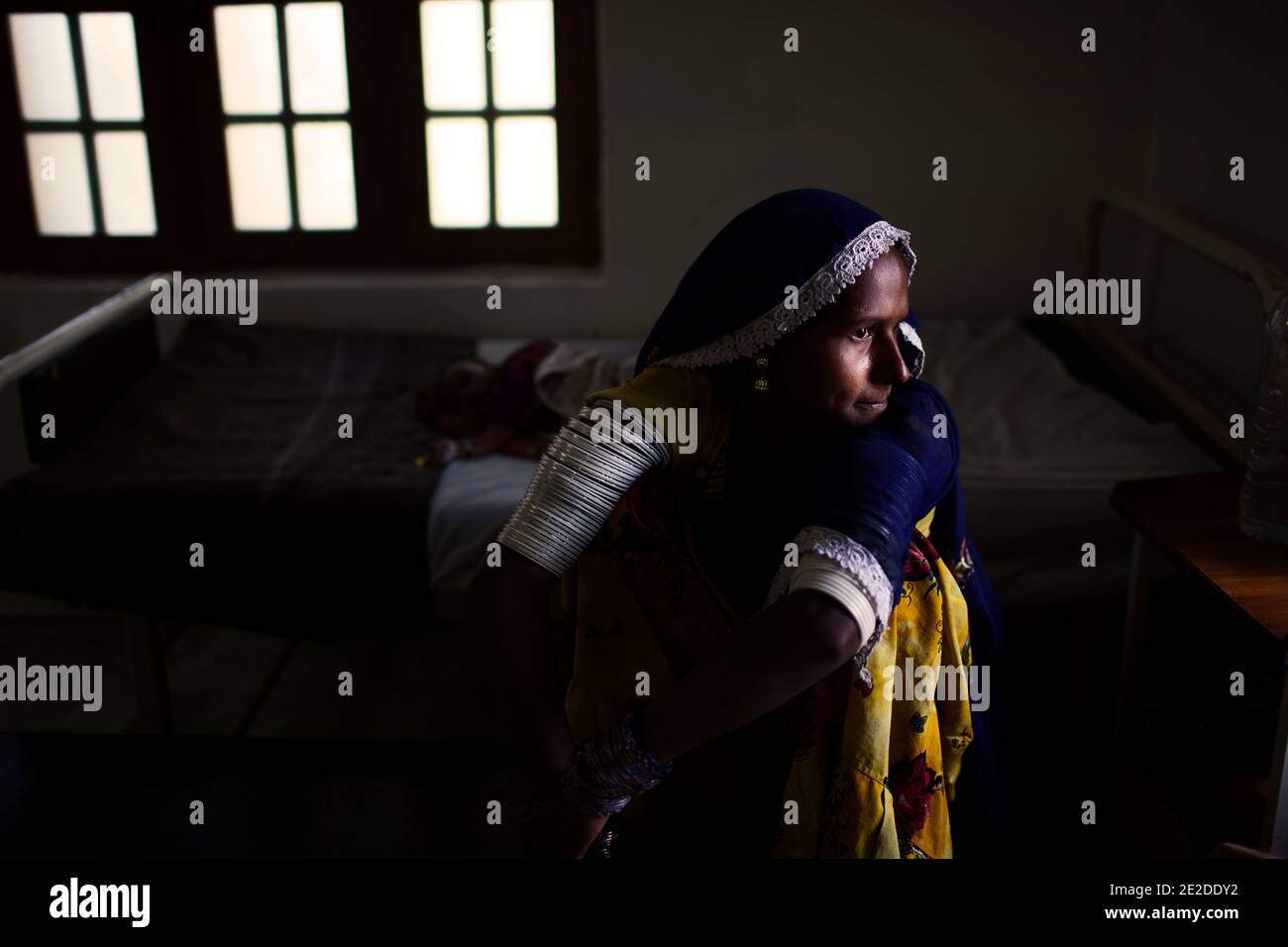 A mother is worried about the health of her son, Pakistan, on October 29, 2011. Pakistan had a high infant mortality rate even before the flood. Photo by ABACAPRESS.COM Stock Photo