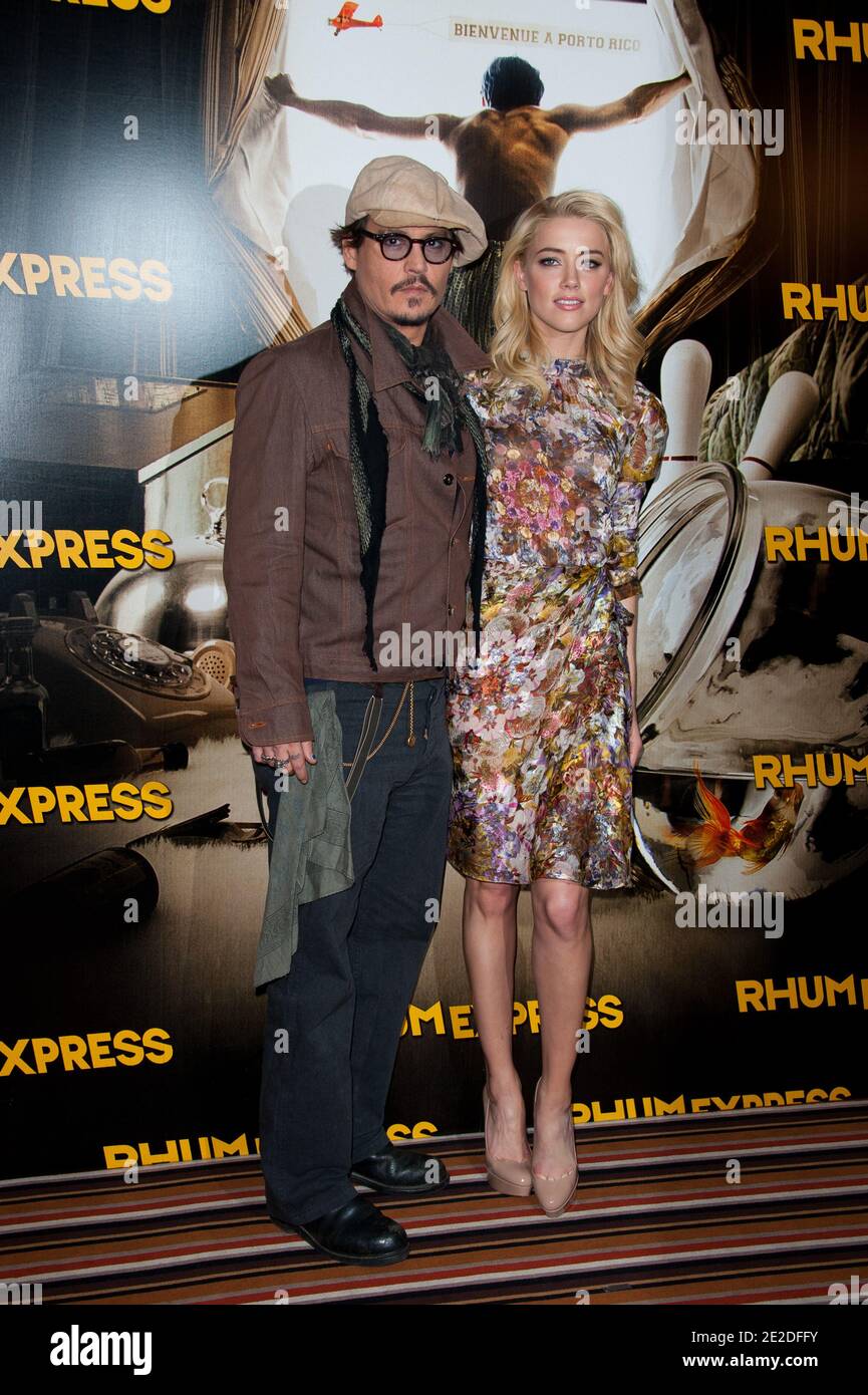 Amber Heard and Johnny Depp attending the 'Rhum Express' (The Rum Diary)  Photocall, before the Premiere in Paris, held at the Plaza Athenee Hotel on  November 08, 2011 in Paris, France. Photo