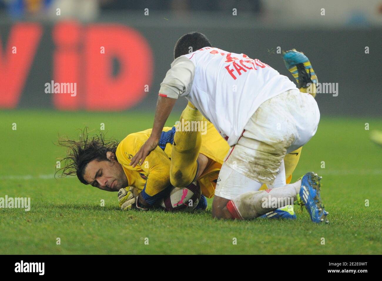 PSG's Salvatore Sirigu battling Nancy's Djamel Bakar during the French First League soccer match, Paris Saint-Germain Vs Nancy in Paris, France on November 20, 2011. Nancy won 1-0. Photo by Henri Szwarc/ABACAPRESS.COM Stock Photo