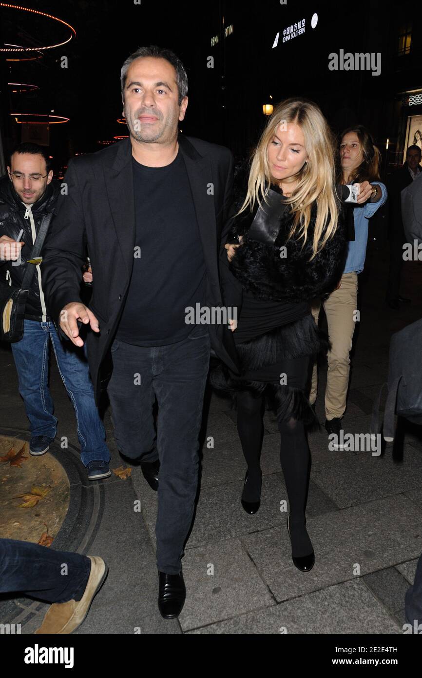 Jean-Yves Le Fur and Sienna Miller attending the Lancel celebration of '135 Years Of French Legerete' Hosted By Sienna Miller in Paris, France on November 24, 2011. Photo by Alban Wyters/ABACAPRESS.COM Stock Photo