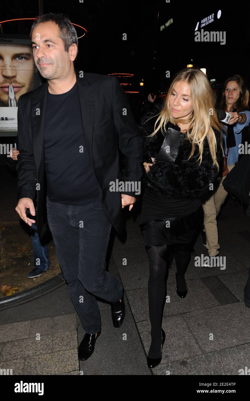 Jean-Yves Le Fur and Sienna Miller attending the Lancel celebration of '135 Years Of French Legerete' Hosted By Sienna Miller in Paris, France on November 24, 2011. Photo by Alban Wyters/ABACAPRESS.COM Stock Photo