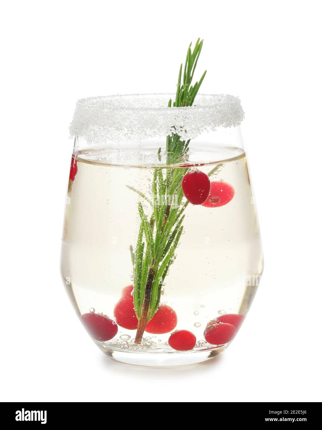 Glass of champagne cocktail with cranberry and rosemary on white background Stock Photo