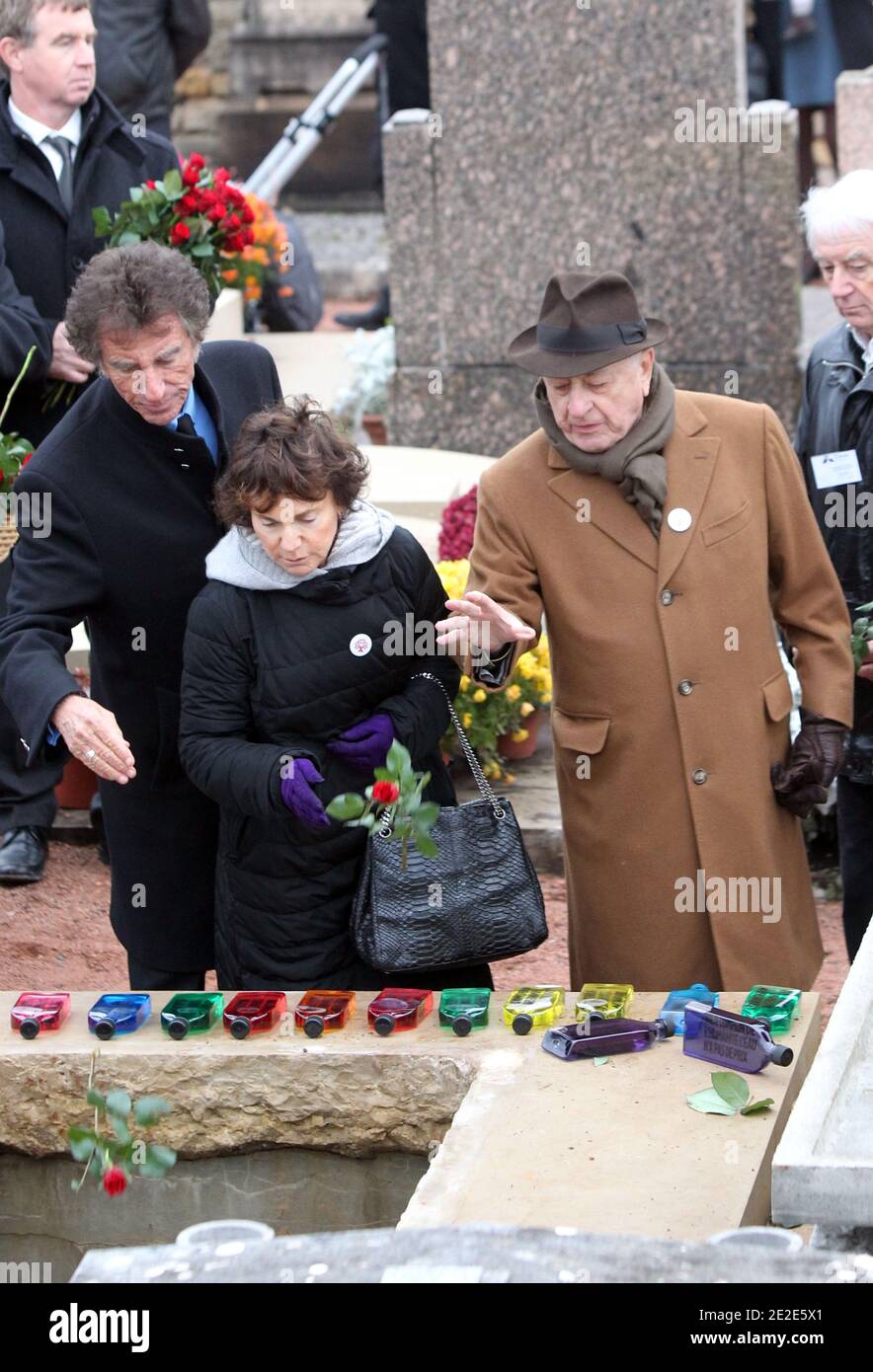 Jack lang , his wife and Pierre Berge attending the funeral of Danielle Mitterrand on November 26, 2011 in Cluny, France. Danielle Mitterrand, First lady of France between 1981 and 1995 and human rights campaigner died in Paris on November 22, 2011. Photo by Vincent Dargent/ABACAPRESS.COM Stock Photo