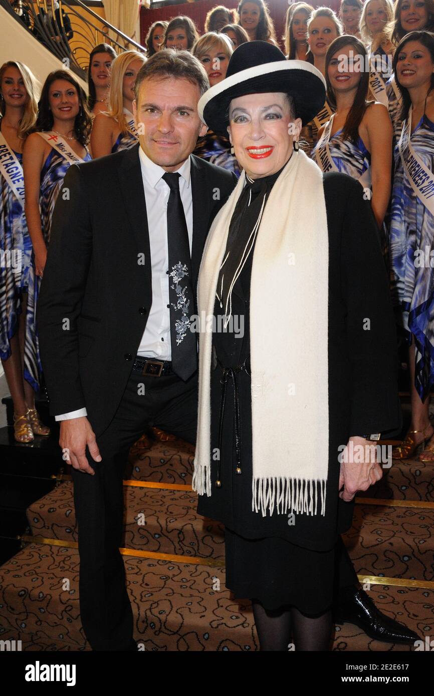 Sud Finances Conseil CEO Olivier Taboue and Genevieve de Fontenay pose at the presentation of the 'Miss Prestige National 2012' pageant at Hotel Arc de Triomphe Hilton' in Paris, France, on November 26, 2011. Photo by Alban Wyters/ABACAPRESS.COM Stock Photo