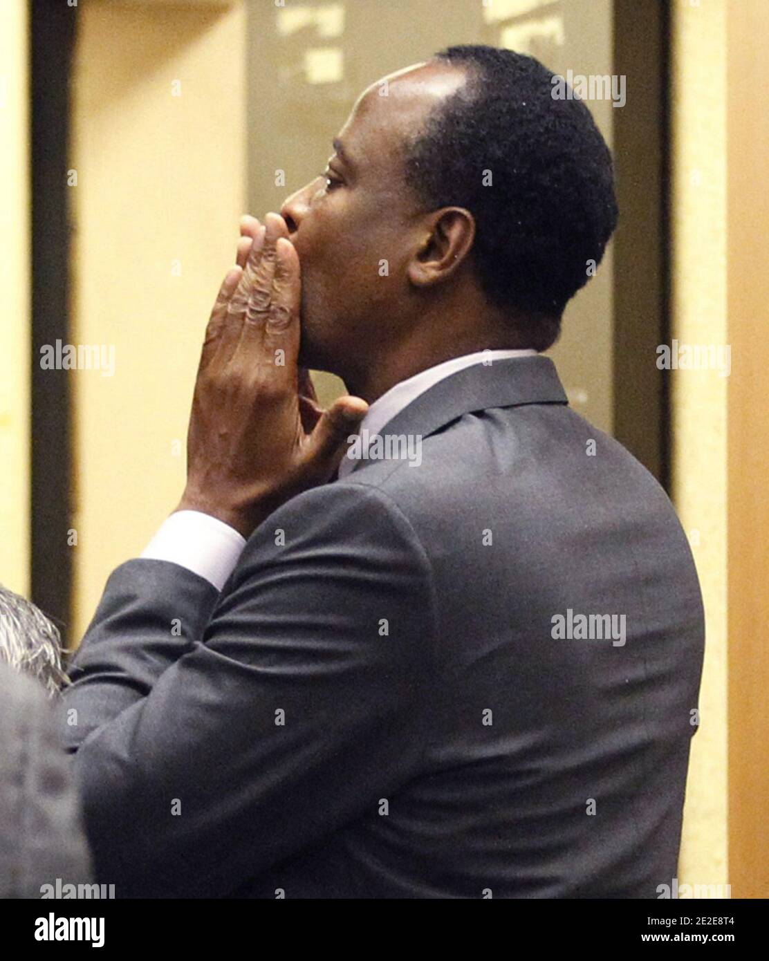 Dr. Conrad Murray blows a kiss to an unidentified member of the courtroom audience after he was sentenced to four years in county jail for his involuntary manslaughter conviction of pop star Michael Jackson in Los Angeles, CA, USA, on November 29, 2011. Photo by Mario Anzuoni/Pool/ABACAPRESS.COM Stock Photo