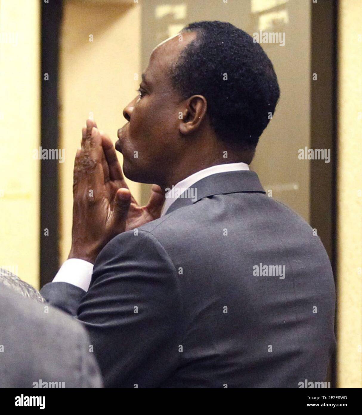 Dr. Conrad Murray blows a kiss to an unidentified member of the courtroom audience after he was sentenced to four years in county jail for his involuntary manslaughter conviction of pop star Michael Jackson in Los Angeles, CA, USA, on November 29, 2011. Photo by Mario Anzuoni/Pool/ABACAPRESS.COM Stock Photo