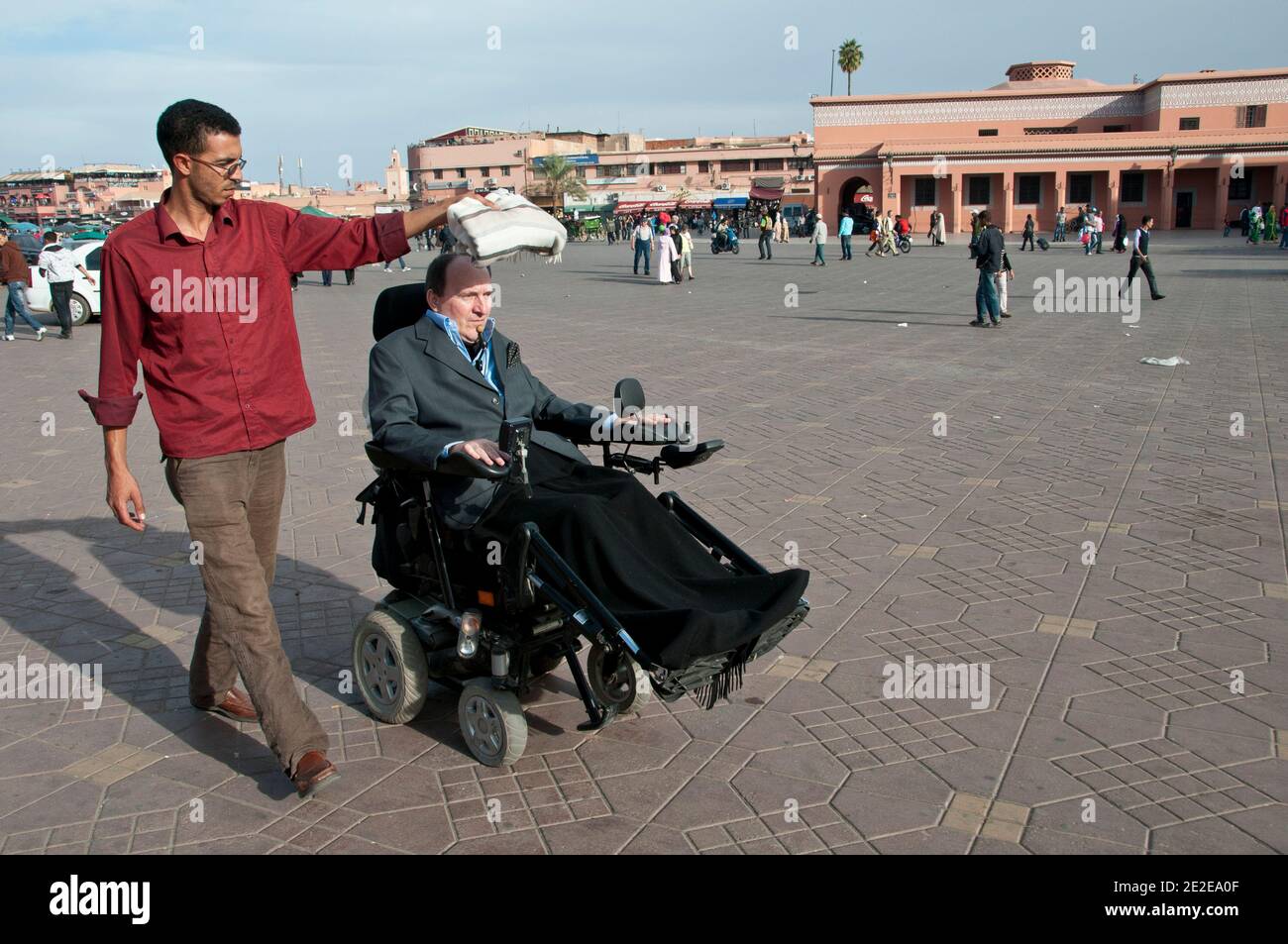 EXCLUSIVE - Philippe Pozzo di Borgo, who became quadriplegic after a paragliding accident in 1993, poses with his new auxiliary Hakim in Marakkech, Morocco, November 13, 2011. His story inspired the movie 'Intouchables' directed by Olivier Nakache and Eric Toledano, released in France on November 2011, in which the actor Francois Cluzet plays his role and actor Omar Sy plays Abdel Seliou's role. In France, the movie reached 10 million of filmgoers. Photo by William Stevens/ABACAPRESS.COM Stock Photo