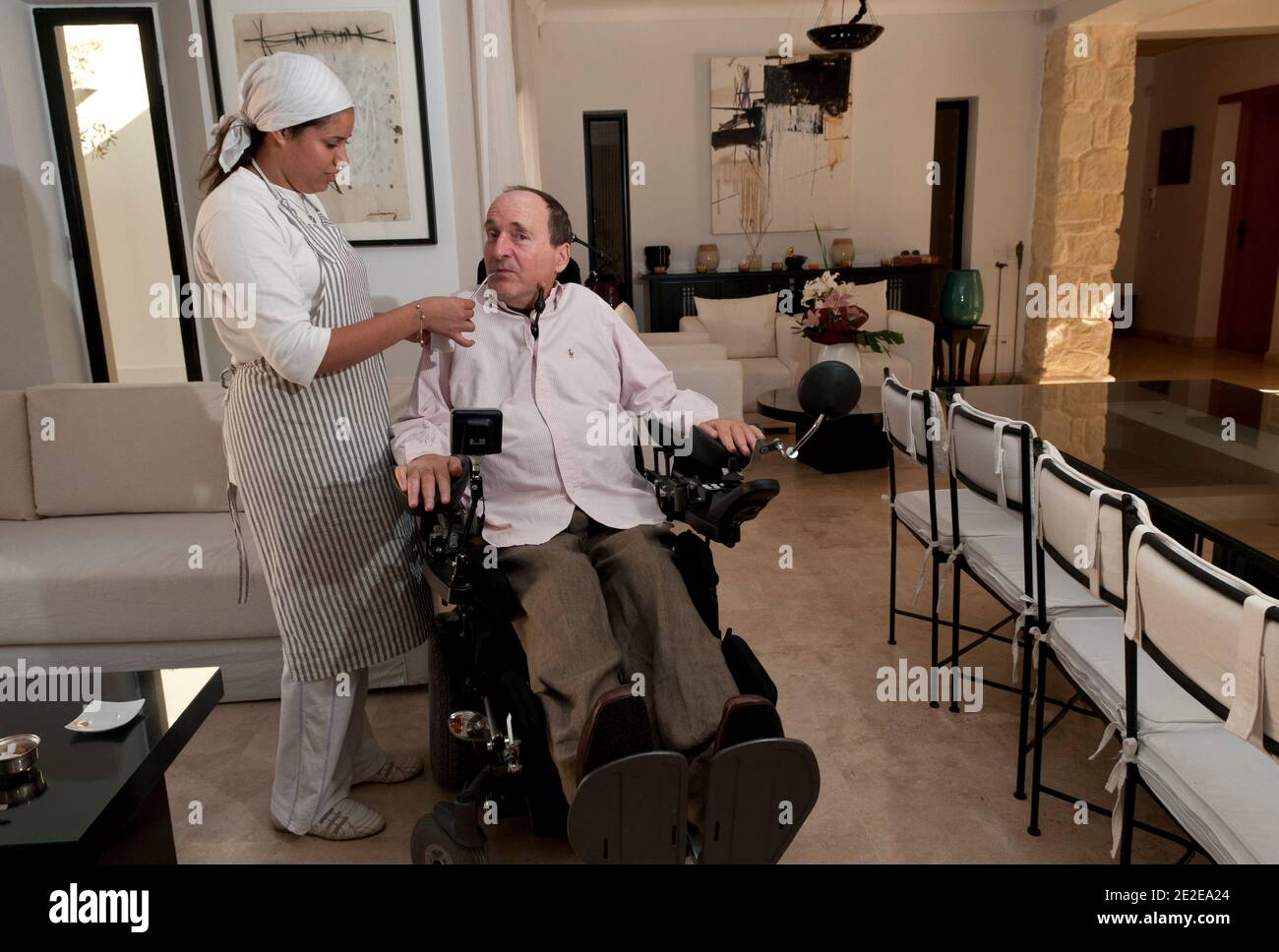 EXCLUSIVE - Philippe Pozzo di Borgo, who became quadriplegic after a paragliding accident in 1993, poses at his home in Essaouira, Morocco, November 15, 2011. His story inspired the movie 'Intouchables' directed by Olivier Nakache and Eric Toledano, released in France on November 2011, in which the actor Francois Cluzet plays his role and actor Omar Sy plays Abdel Seliou's role. In France, the movie reached 10 million of filmgoers. Photo by William Stevens/ABACAPRESS.COM Stock Photo